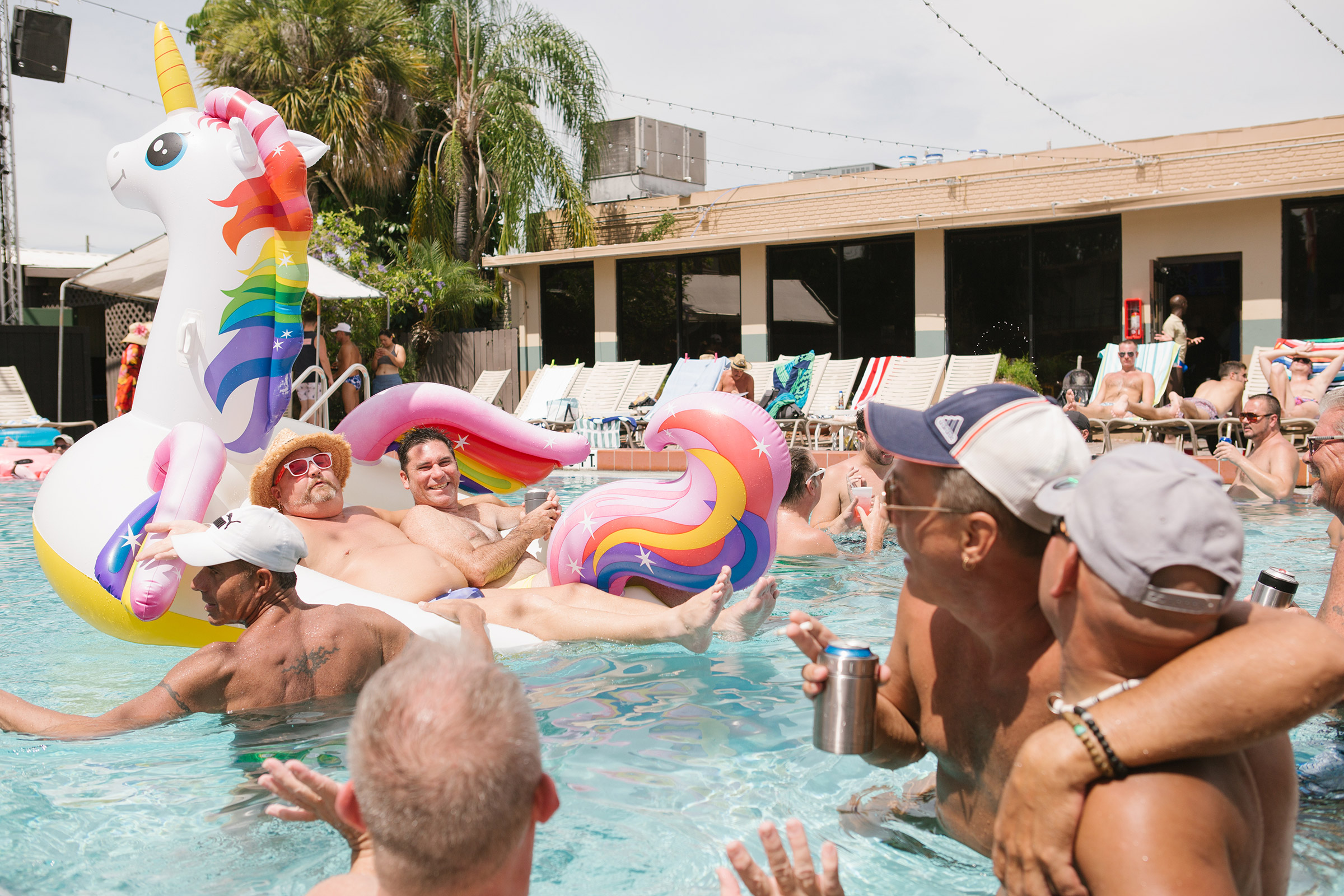 Allen, second from right, and others at a pool party at Parliament House, Orlando's iconic 44-year-old LGBTQ resort that includes several bars, hotel rooms, nightclub and restaurant, on June 22. (Alicia Vera for TIME)