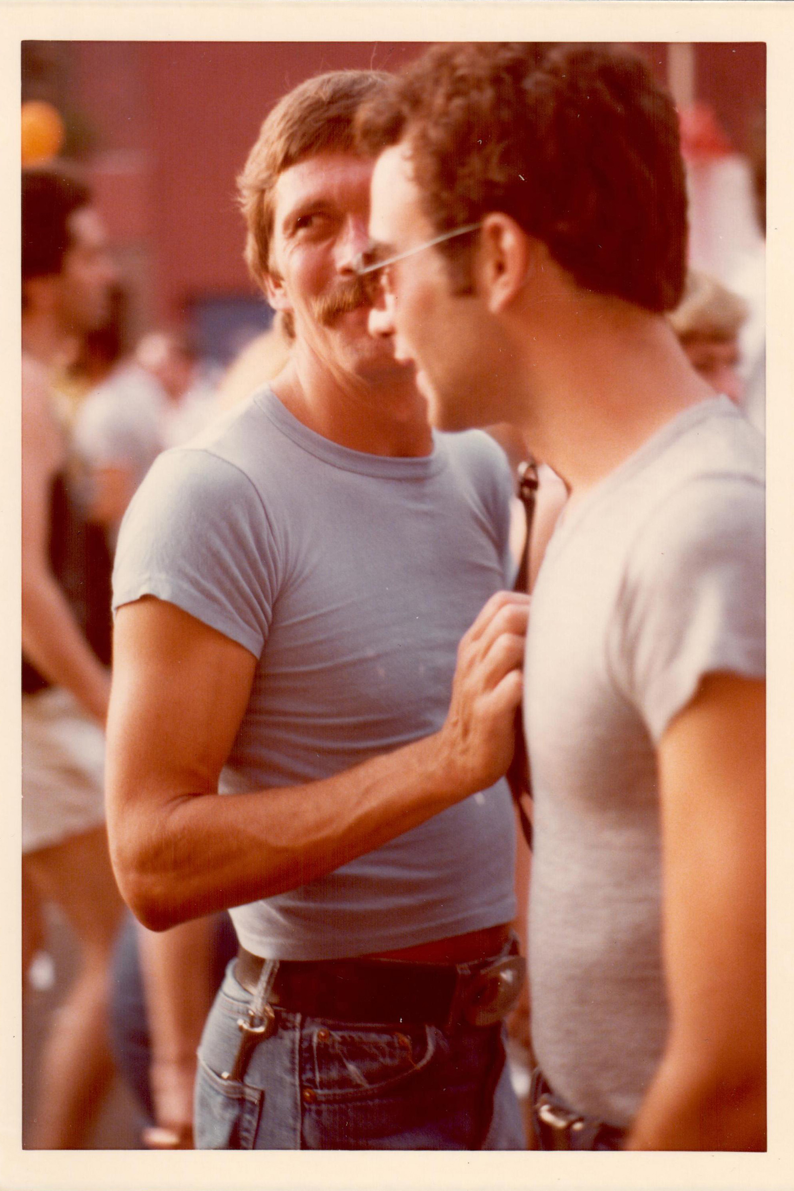Two men during the Pride Parade in 1977