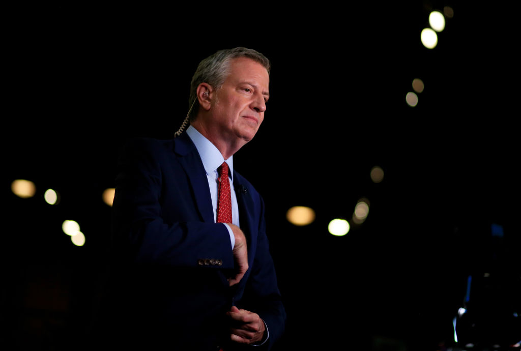 Democratic presidential candidate New York City Mayor Bill De Blasio prepares for a television interview in the spin room before the second night of the first Democratic presidential debate June 27, 2019 in Miami, Florida. (Cliff Hawkins—Getty Images)