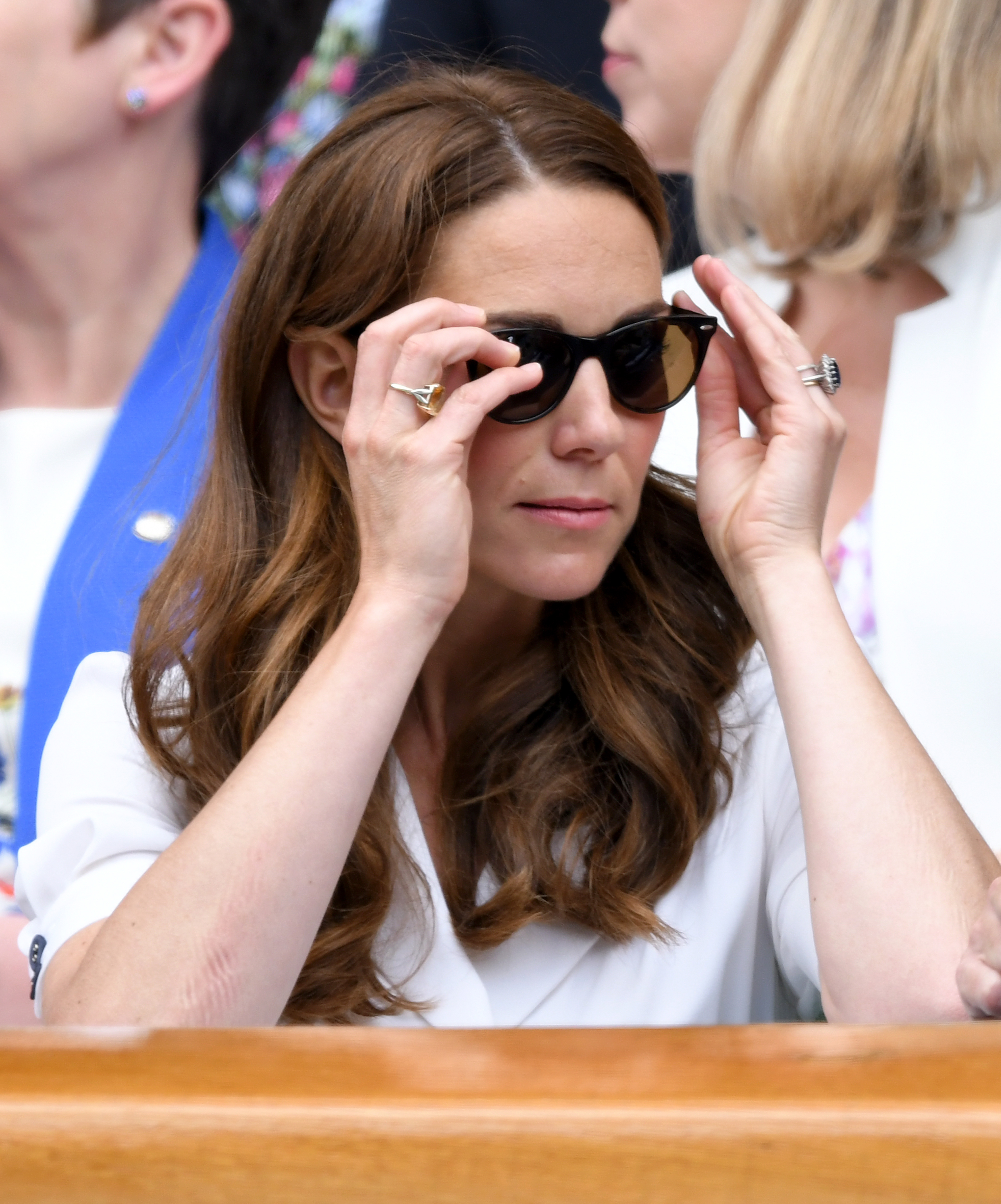 LONDON, ENGLAND - JULY 02: Catherine, Duchess of Cambridge adjusts her sunglasses as she attends day 2 of the Wimbledon Tennis Championships at the All England Lawn Tennis and Croquet Club on July 02, 2019 in London, England. (Photo by Karwai Tang/Getty Images) (Karwai Tang—Getty Images)
