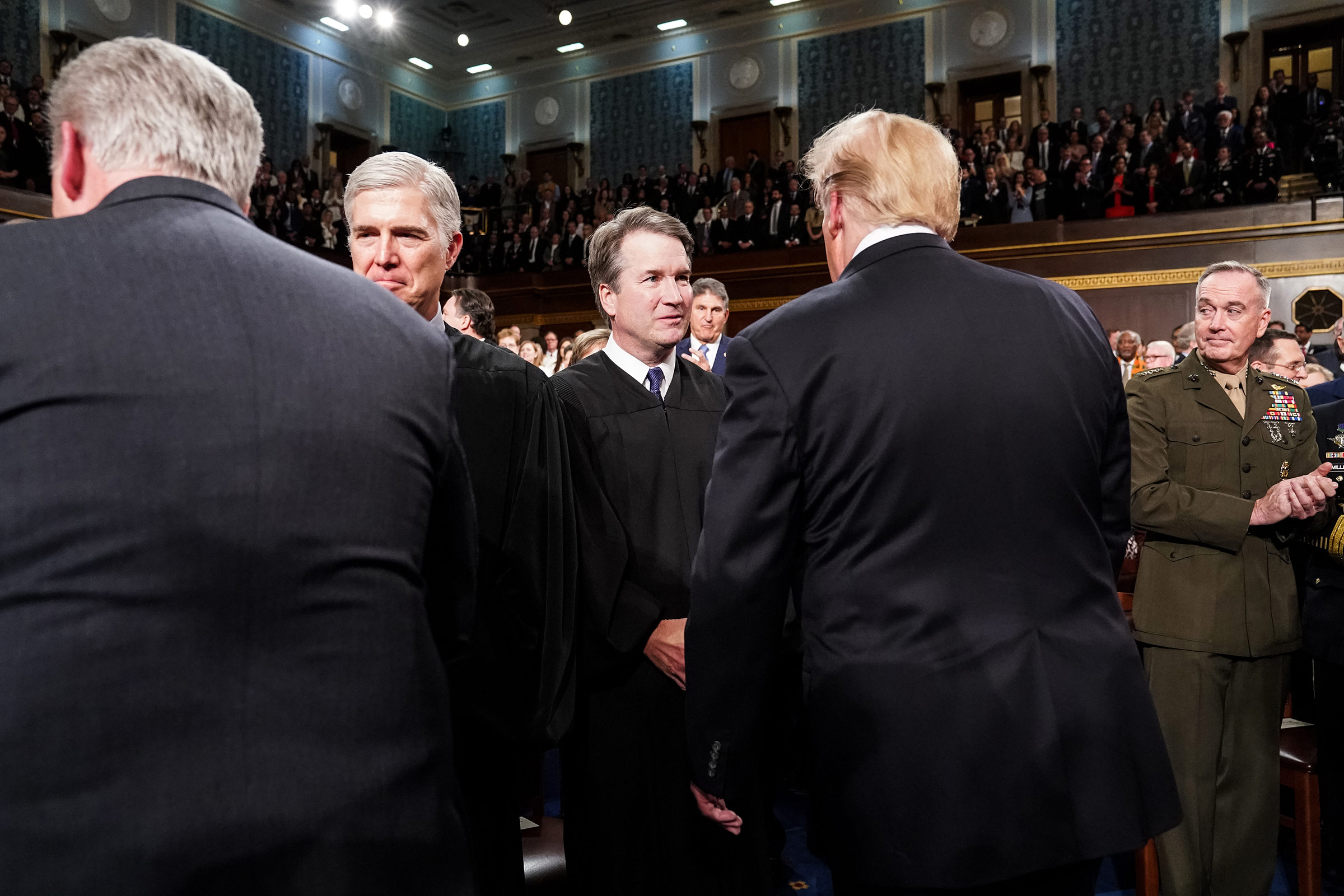 Supreme Court Justice Brett Kavanaugh shook hands with President Donald Trump before the State of the Union address at the Capitol in Washington, DC on February 5, 2019. (Martin H. Simon—Pool/Redux)