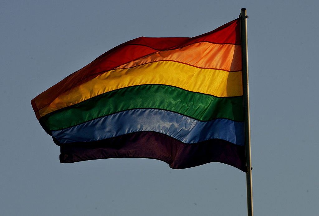 A rainbow flag flies above the San Diego Lesbian Gay Bisexual Transgender Community Center. (Sandy Huffaker—Getty Images)