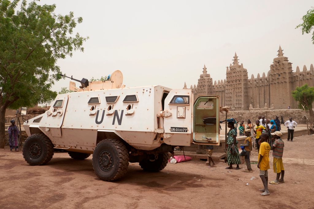 An armoured vehicle of the United Nations Multidimensional Integrated Stabilisation Mission in Mali (MINUSMA) patrols during the annual rendering of the Great Mosque of Djenne in central Mali, on April 28, 2019. (Michele Cattani—AFP/Getty Images)