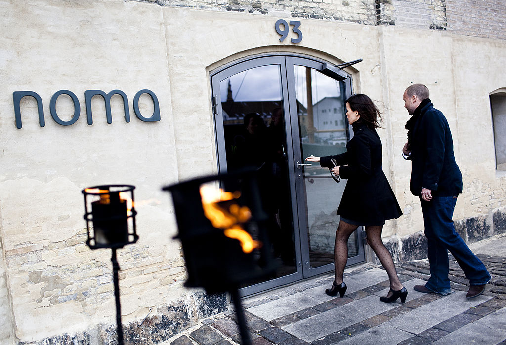 People enter the Noma restaurant in Copenhagen, on April 27, 2010 the day after Noma was chosen for the world's best restaurant, according to the Worlds 50 Best Restaurants Award, which was awarded in London. (Casper Christoffersen—AFP/Getty Images)