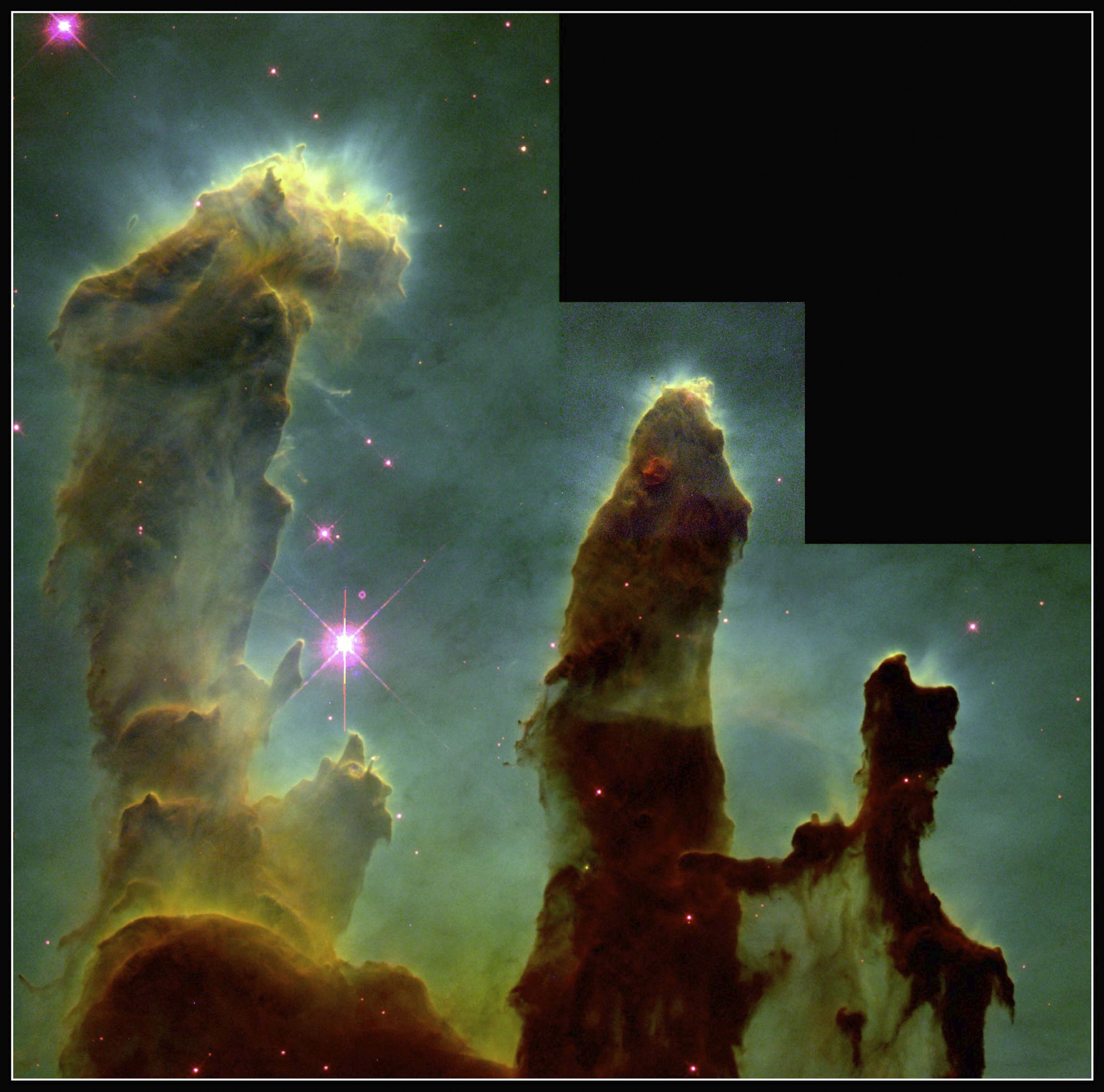 These eerie, dark pillar-like structures are columns of cool interstellar hydrogen gas and dust that are also incubators for new stars. The pillars protrude from the interior wall of a dark molecular cloud like stalagmites from the floor of a cavern. They are part of the Eagle Nebula and were captured by the Hubble telescope in 1995 (Science &amp; Society Picture Library—SSPL via Getty Images)