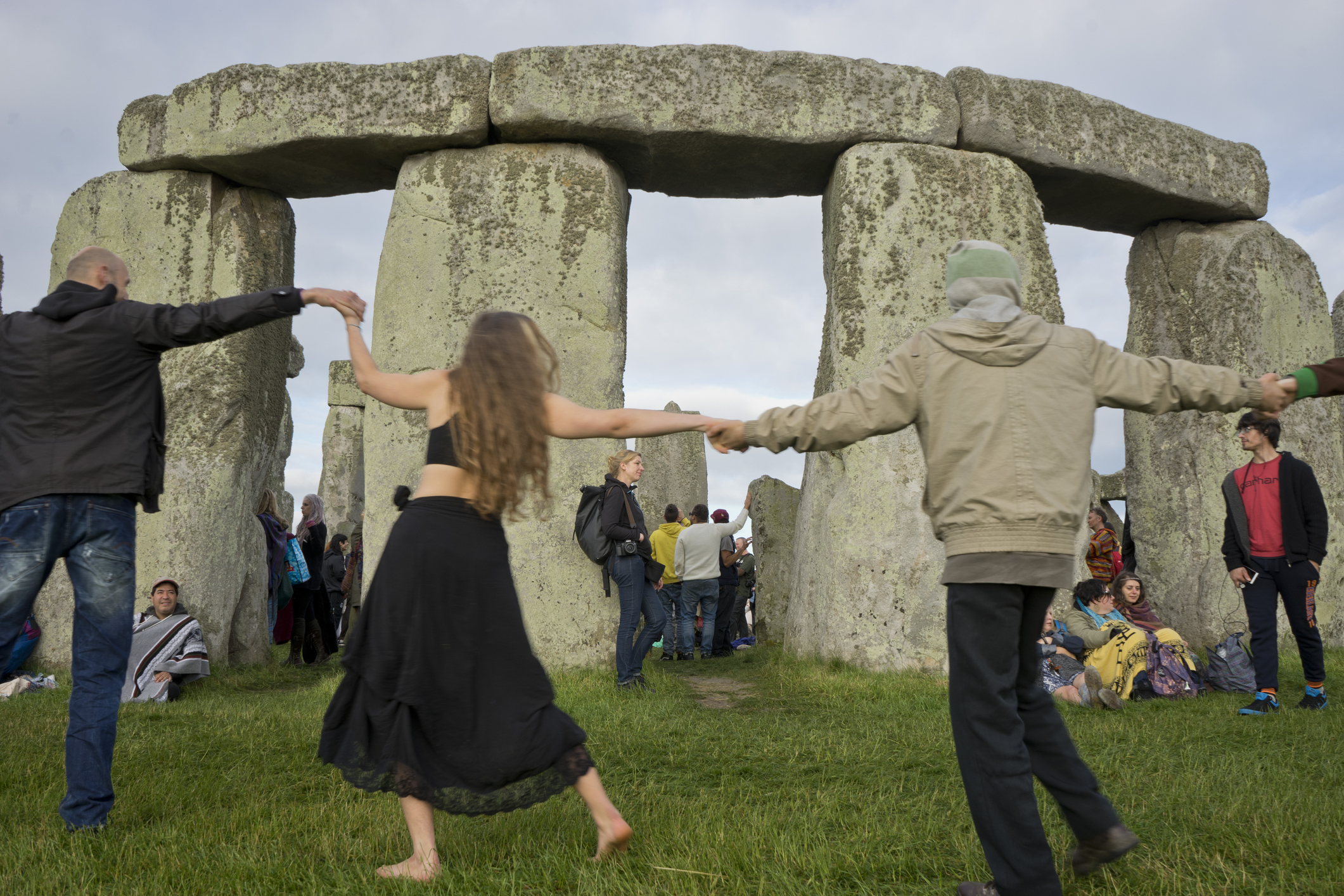 Revellers gather at historic monument for Summer Solstice celebrations, 21 June 2016, Stonehenge, UNESCO World Heritage Site, Wiltshire, England, United Kingdom, Europe