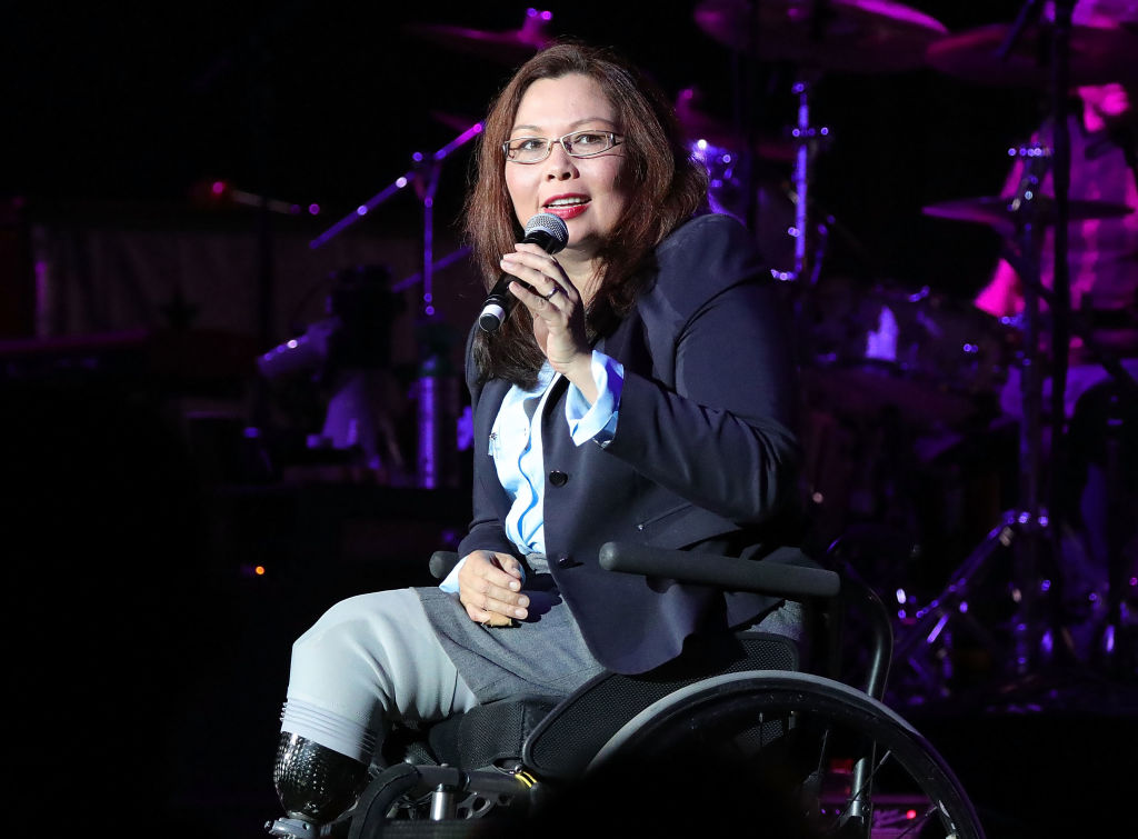 Sen. Tammy Duckworth speaks at the VetsAid Charity Benefit Concert at Eagle Bank Arena on Sept. 20, 2017 in Fairfax, Virginia. (Paul Morigi—Getty Images)