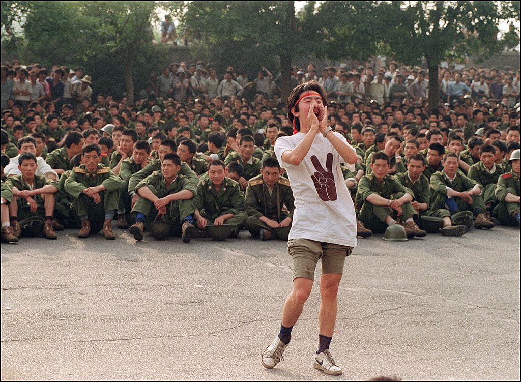 A dissident student asks soldiers to go back home