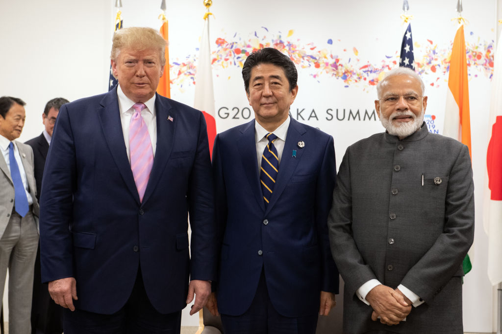 U.S President Donald Trump, Japan's Prime Minister, Shinzo Abe and India's Prime Minister, Narendra Modi, take part in a trilateral meeting on the first day of the G20 summit on June 28, 2019 in Osaka, Japan. (Carl Court—Getty Images)