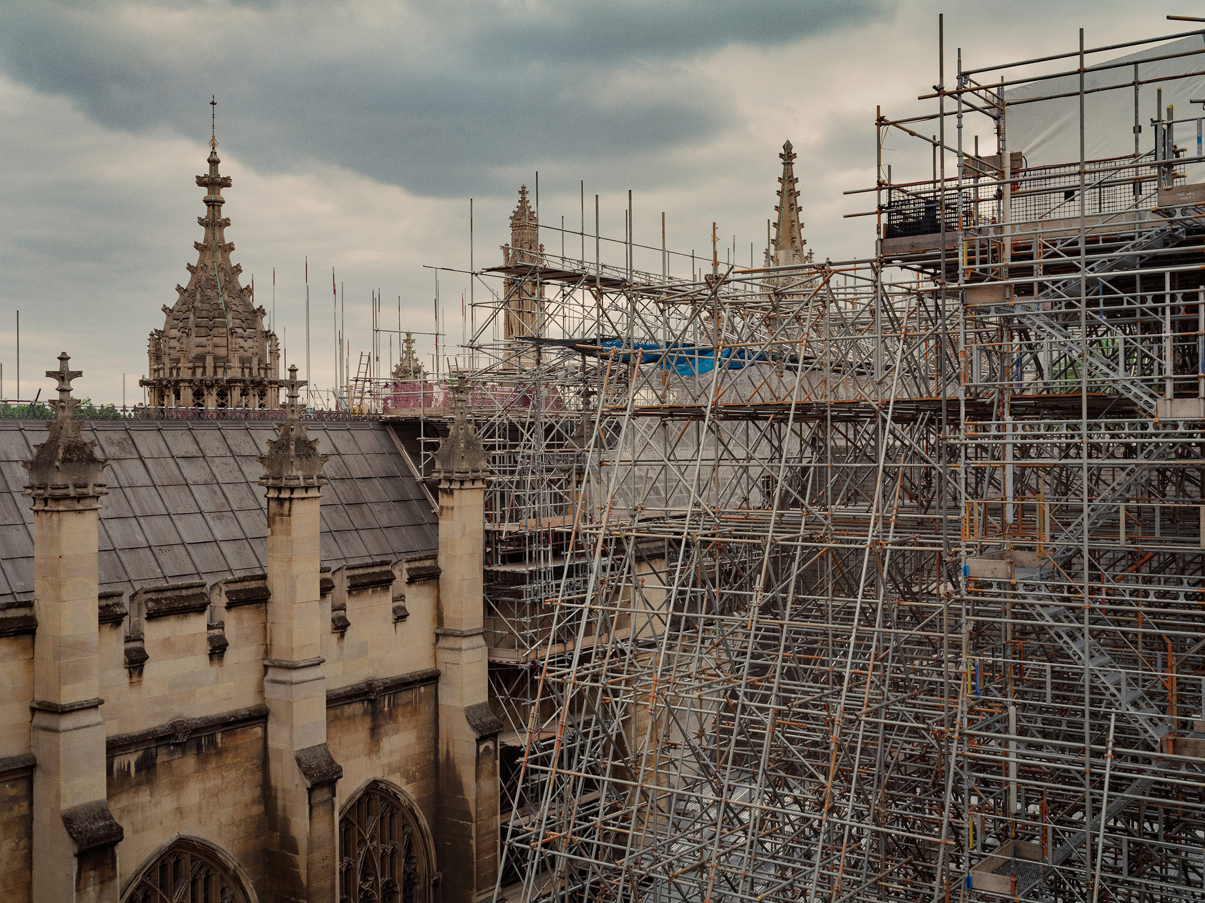 A view from the roof of the Palace of Westminster showing damage to the roof (left) and scaffolding erected for repair work (right). (Ben Quinton for TIME)