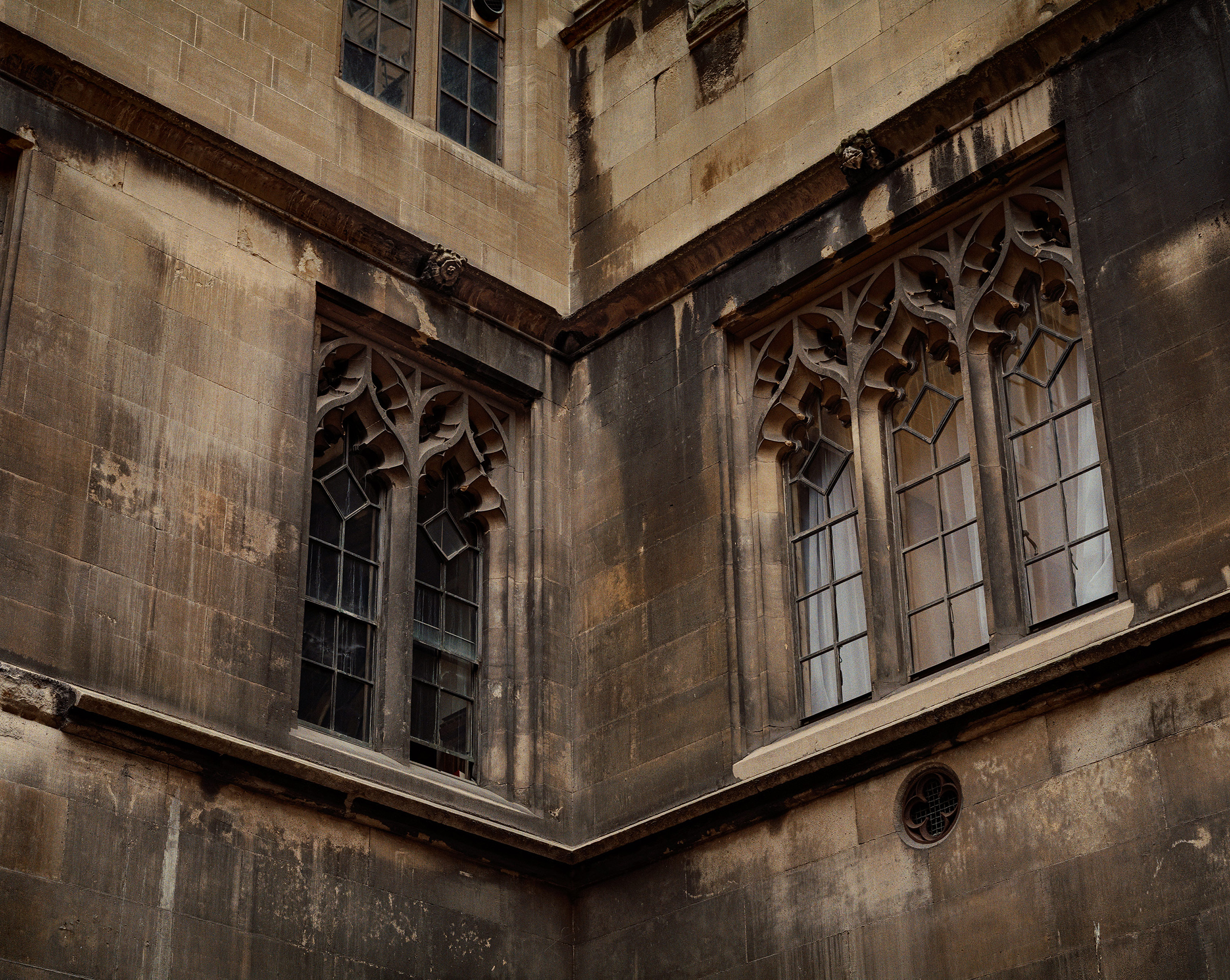 Blocks of masonry missing (bottom left), and blackened brickwork in the Palace of Westminster, London, on May 30, 2019. (Ben Quinton for TIME)
