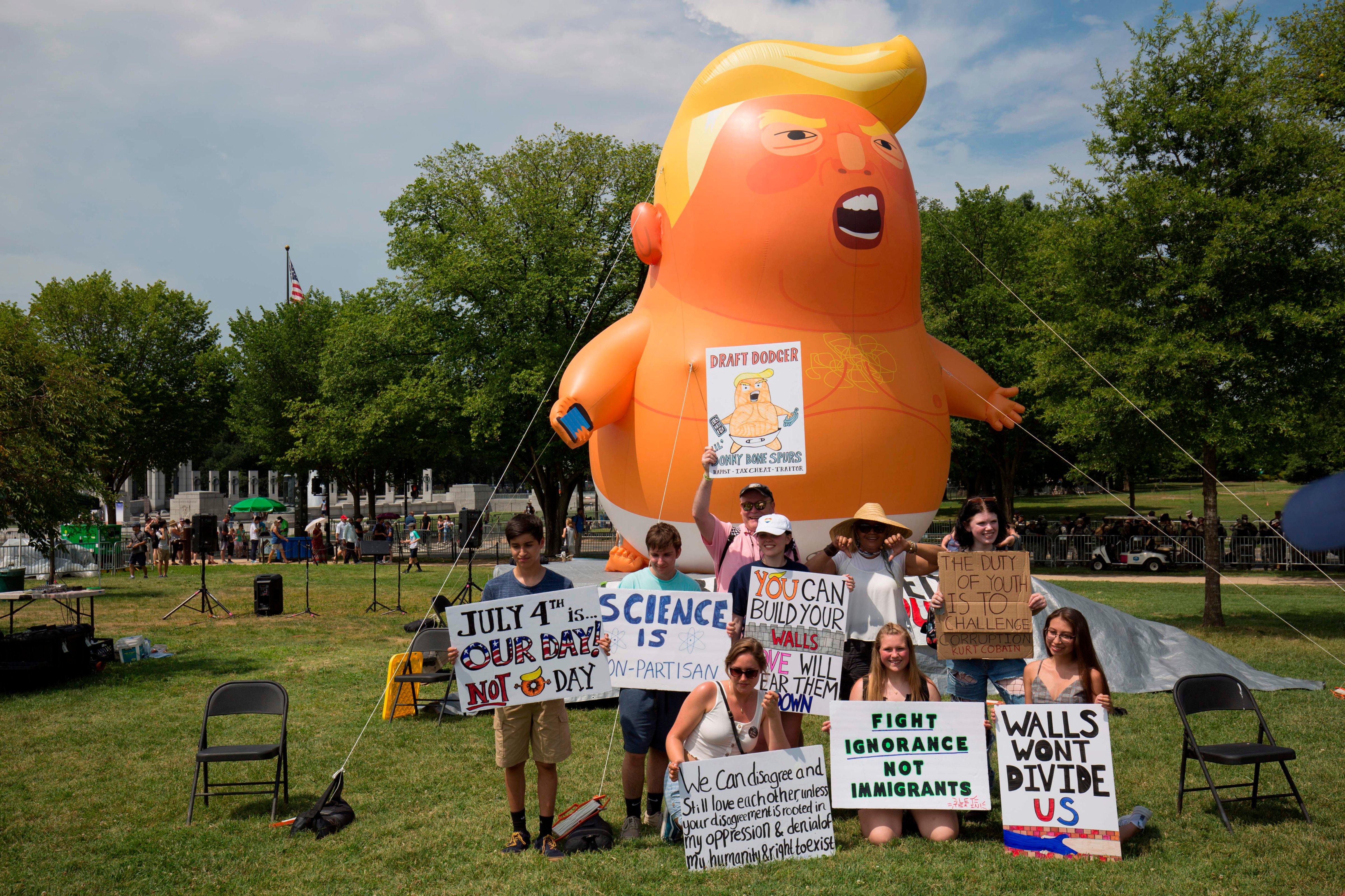 A "Trump Baby" balloon, set up by members of the CodePink protest group, is seen ahead of the "Salute to America" Fourth of July event with US President Donald Trump at the Lincoln Memorial on the National Mall in Washington, DC, on July 4, 2019. (ALASTAIR PIKE—AFP/Getty Images)