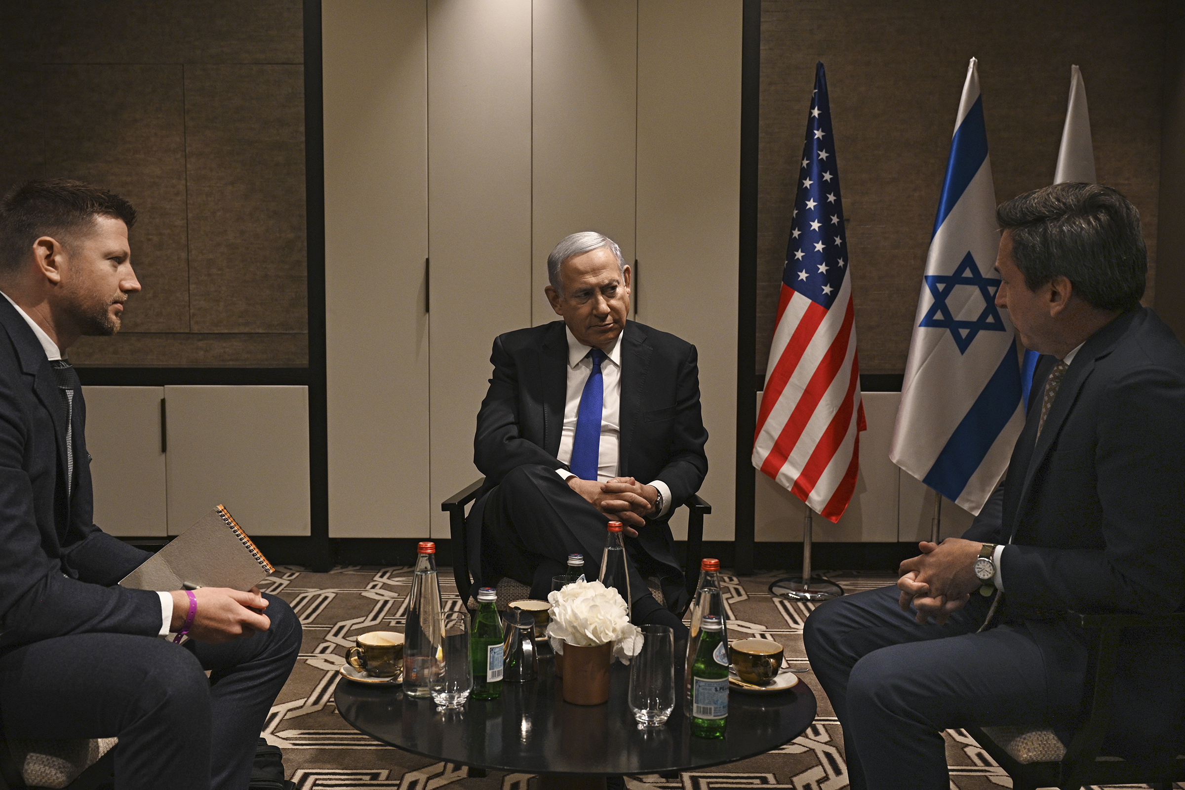 Prime Minister Benjamin Netanyahu spoke to TIME's Brian Bennett, right, and Joseph Hincks in Jerusalem on June 25.