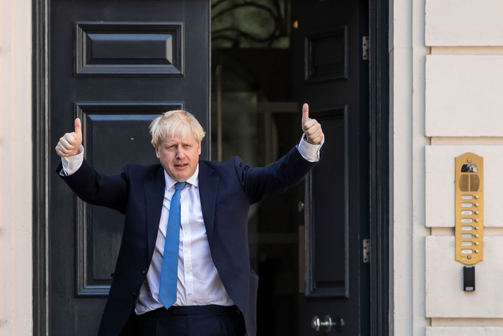 Newly elected Conservative party leader Boris Johnson poses outside the Conservative Leadership Headquarters on July 23, 2019 in London, England. Johnson officially took office as Prime Minister of the UK Wednesday morning. (Dan Kitwood&mdash;Getty Images)