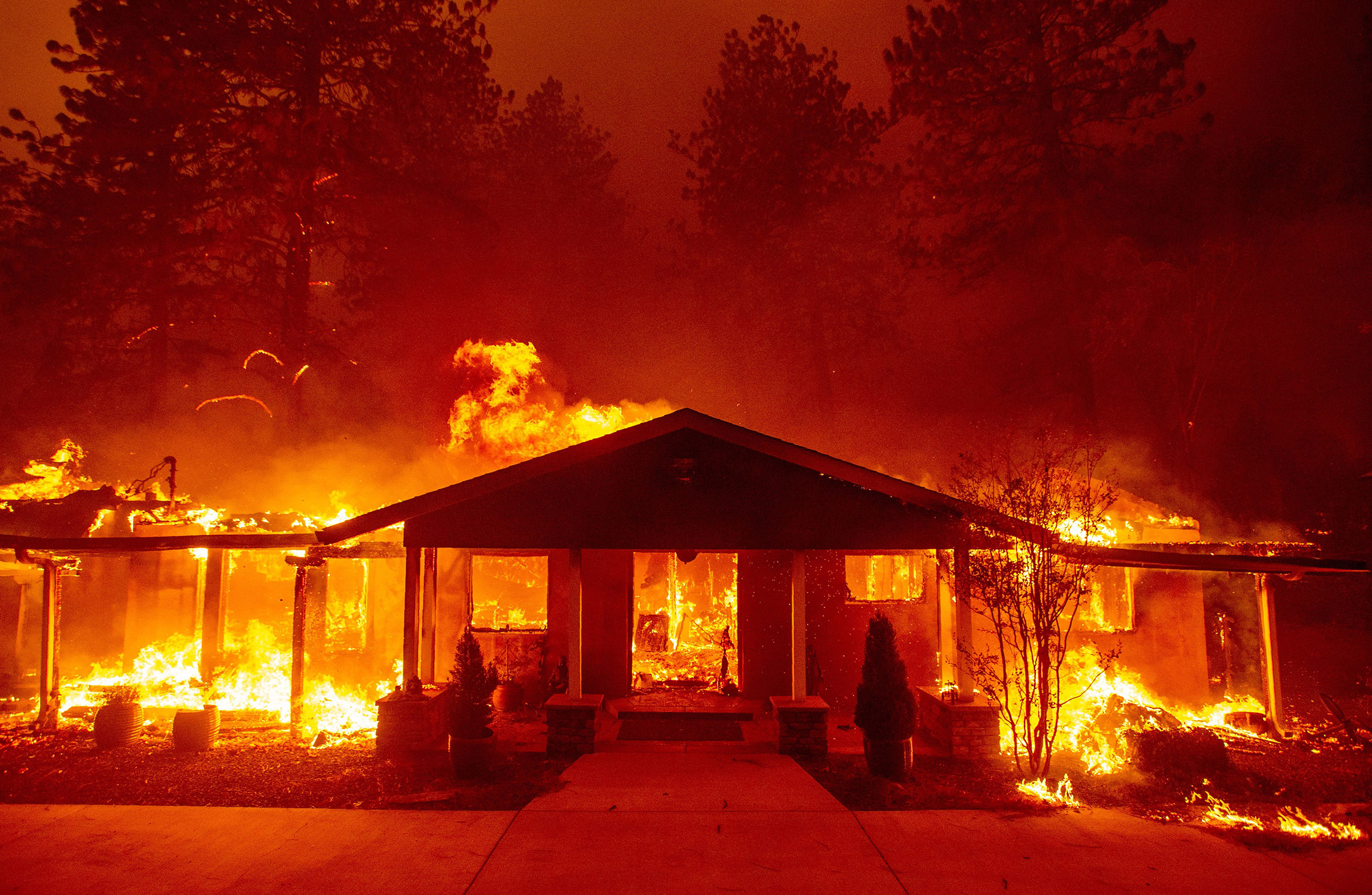 A home burns during the Camp fire in Paradise, California on Nov. 8, 2018. (Josh Edelson—AFP/Getty Images)