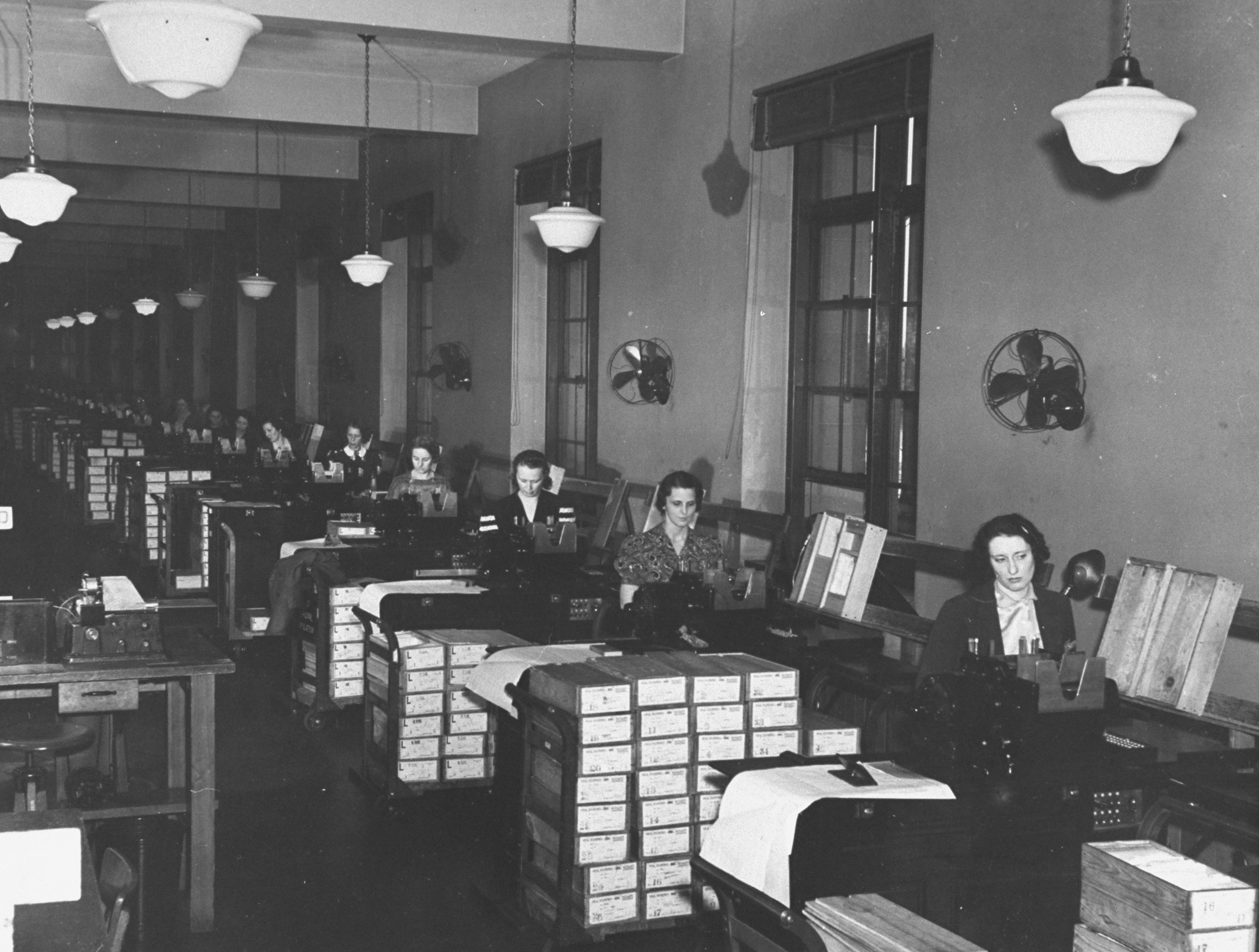 A view of tabulators working at their desks in the Census Bureau. (Thomas D. McAvoy—The LIFE Picture Collection/Getty Images)