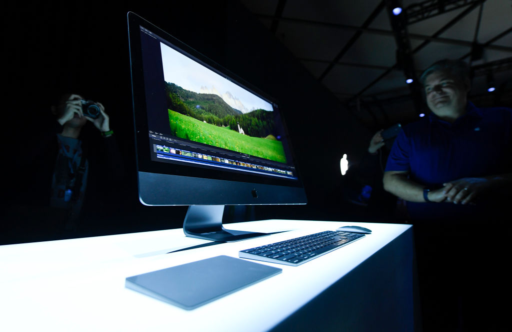 Attendees look at the new Apple iMac Pro desktop computers the 2017 Apple Worldwide Developer Conference (WWDC) at San Jose Convention Center on June 5, 2017 in San Jose, California, America. (VCG&mdash;VCG via Getty Images)