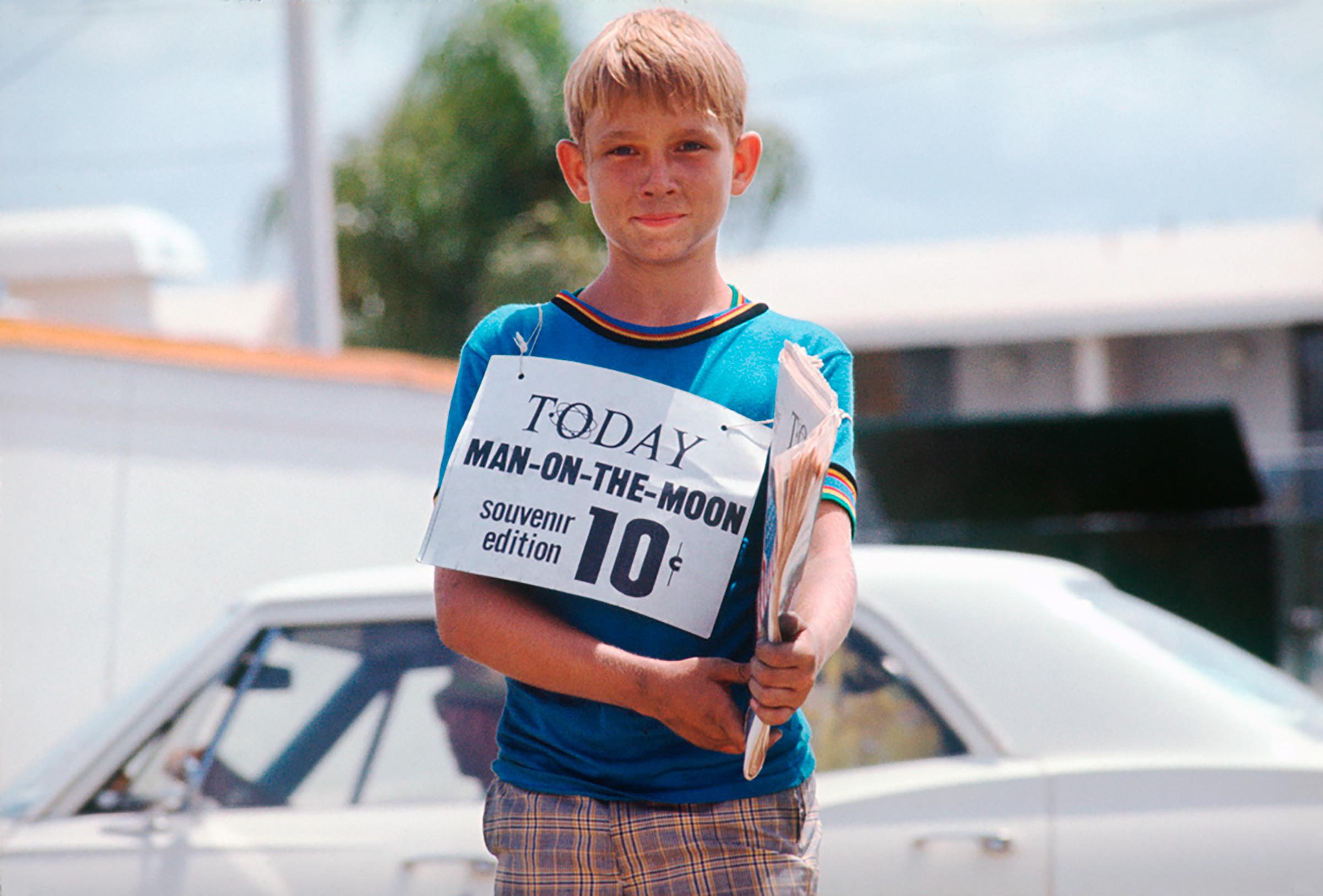 A young boy sells souvenirs in Titusville, Florida. (David Burnett —Contact Press Images for TIME)