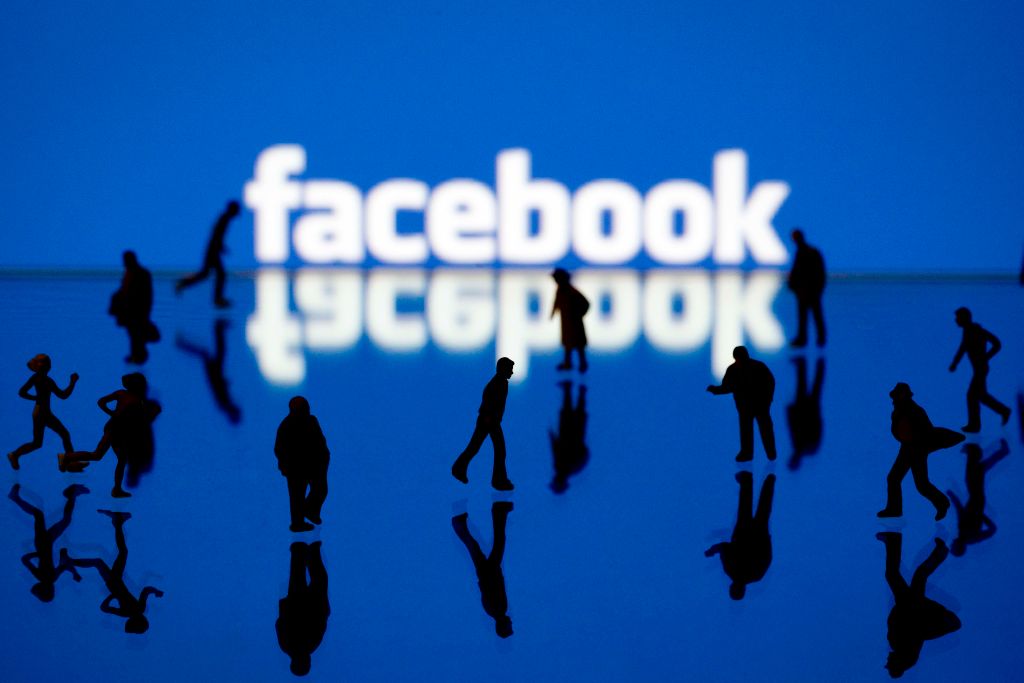 Picture taken on May 12, 2012 in Paris shows an illustration made with figurines set up in front of Facebook's homepage. (Joel Saget&mdash;AFP/Getty Images)