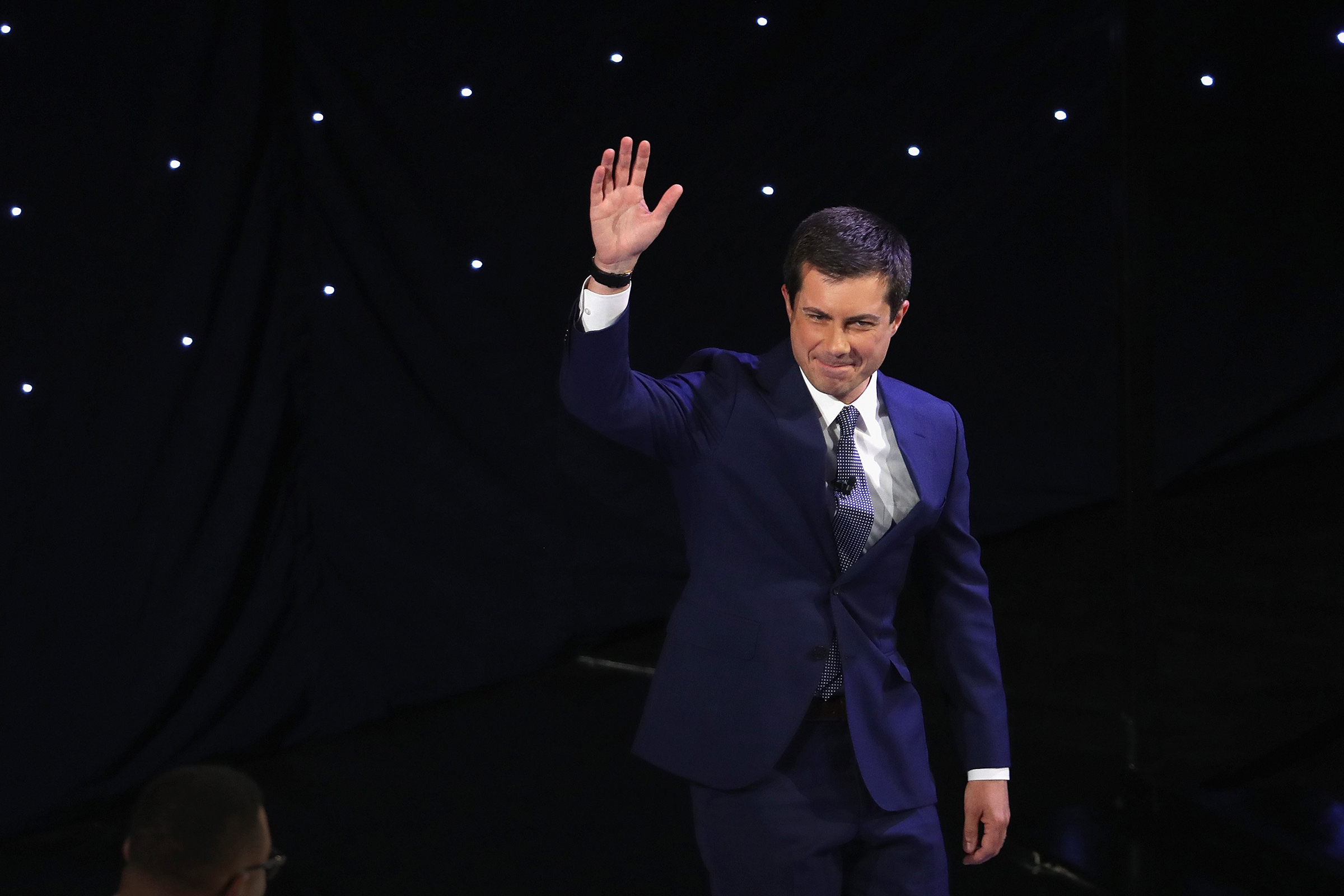 Democratic presidential candidate South Bend, Indiana Mayor Pete Buttigieg takes the stage at the beginning of the Democratic Presidential Debate at the Fox Theatre July 30, 2019 in Detroit, Michigan. (Justin Sullivan—Getty Images)