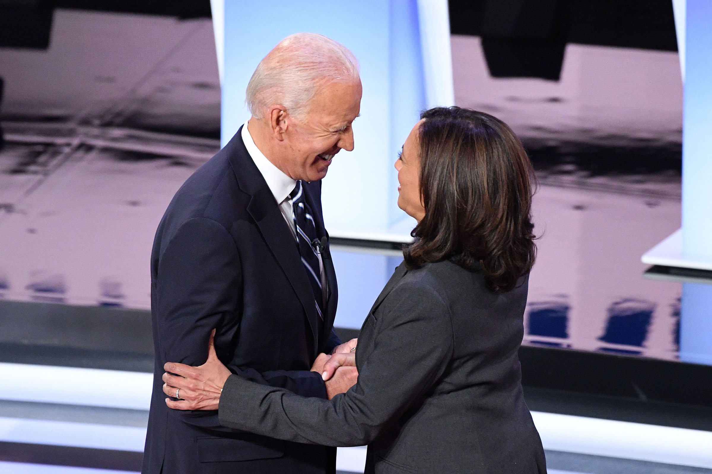 Democratic presidential hopefuls former Vice President Joe Biden (L) and US Senator from California Kamala Harris greet each other ahead of the second round of the second Democratic primary debate of the 2020 presidential campaign season hosted by CNN at the Fox Theatre in Detroit, Michigan on July 31, 2019. (Jim Watson—AFP/Getty Images)