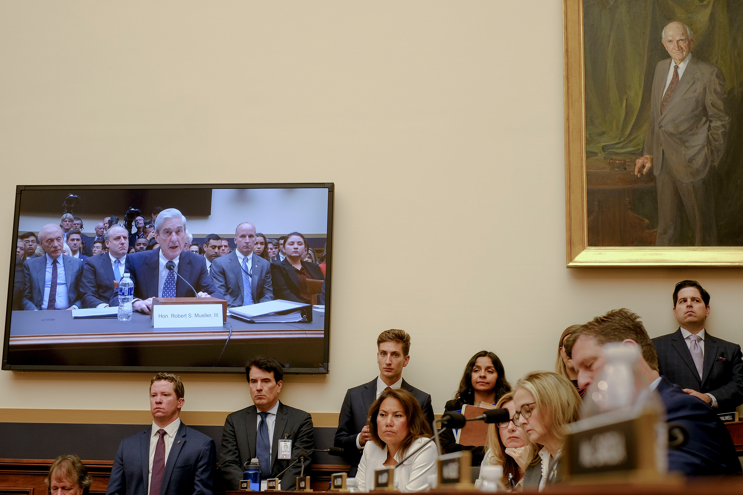 A television in the room broadcasts Mueller's testimony before the House Judiciary Committee. (Gabriella Demczuk for TIME)