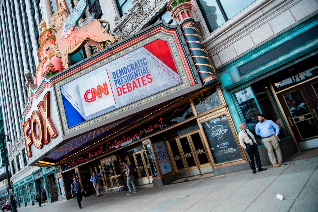 People stand outside the Fox Theatre ahead of the democratic debates in Detroit, Michigan on July 29, 2019. (JIM WATSON—AFP/Getty Images)
