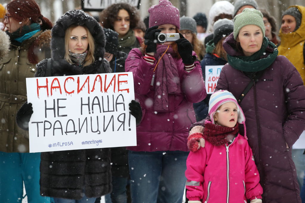 People gather in Moscow's Sokolniki Park to protest against a bill decriminalizing domestic violence, signed into law by Russia's President Vladimir Putin on February 7, 2017. (Sergei Fadeichev—TASS via Getty Images)