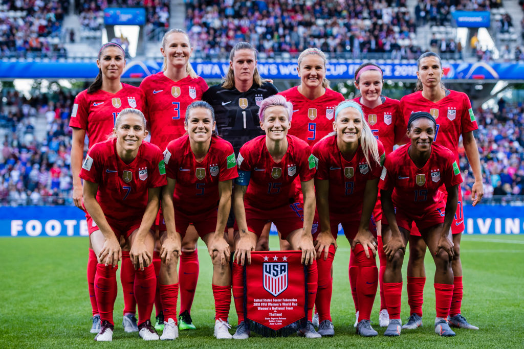 (L-R) Alex Morgan, Samantha Mewis, Alyssa Naeher, Lindsey Horan, Rose Lavelle, Tobin Heath, Abby Dahlkemper, Kelley Ohara, Megan Rapinoe, Julie Ertz and Crystal Dunn poses for team photo during the 2019 FIFA Women's World Cup France group F match between USA and Thailand at Stade Auguste Delaune on June 11, 2019 in Reims, France. (Marcio Machado—Getty Images)