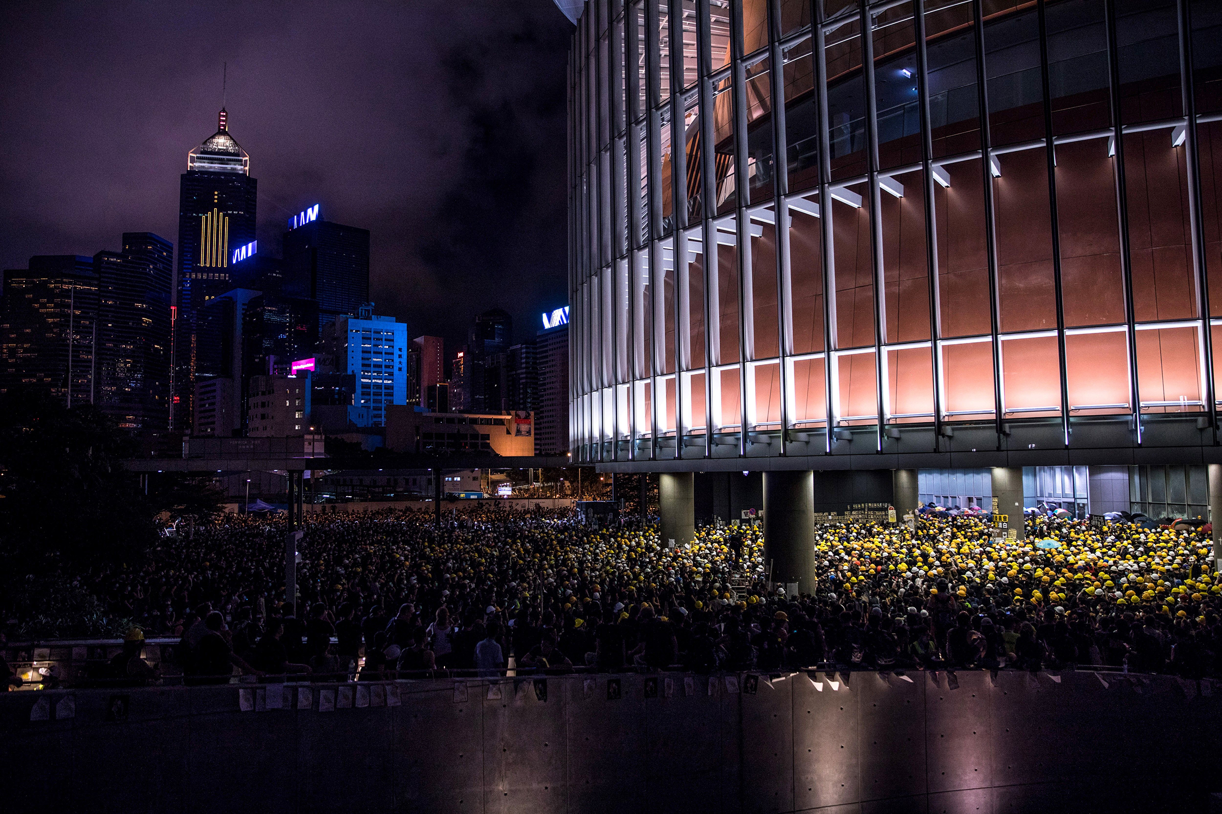 Protesters gathered outside the government headquarters in Hong Kong on July 1, 2019, on the 22nd anniversary of the city's handover from Britain to China. (Dale de la Rey—AFP/Getty Images)