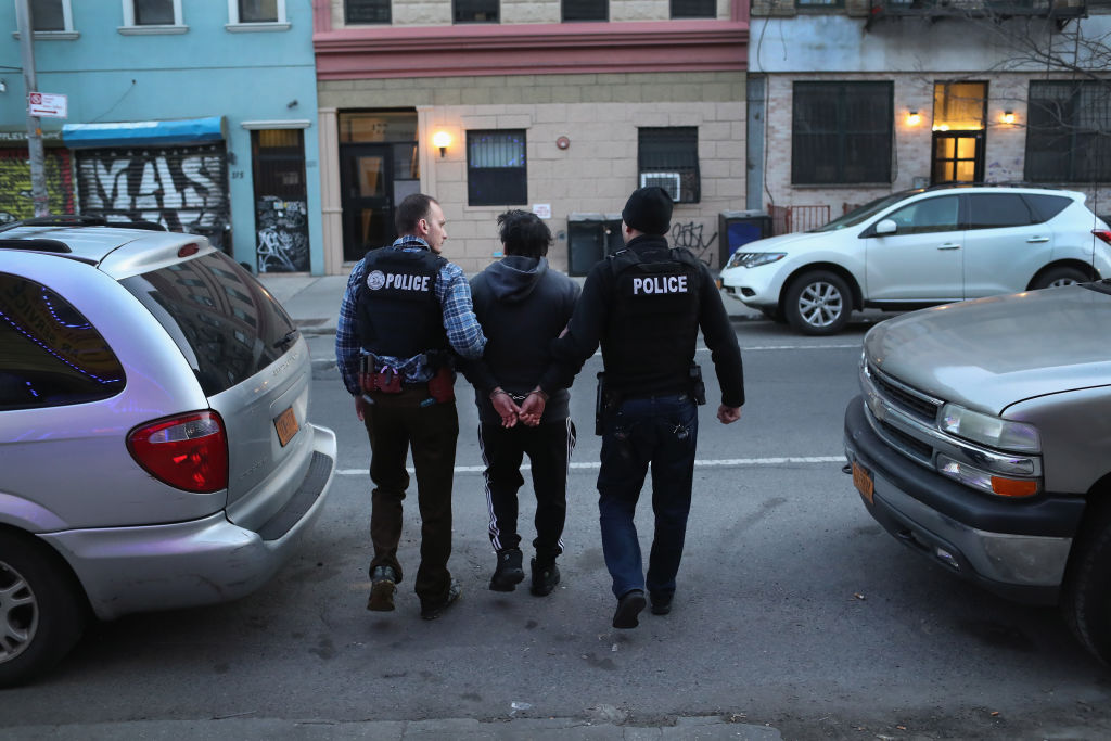U.S. Immigration and Customs Enforcement (ICE), officers arrest an undocumented Mexican immigrant during a raid in the Bushwick neighborhood of Brooklyn on April 11, 2018 in New York City. (John Moore&mdash;Getty Images)