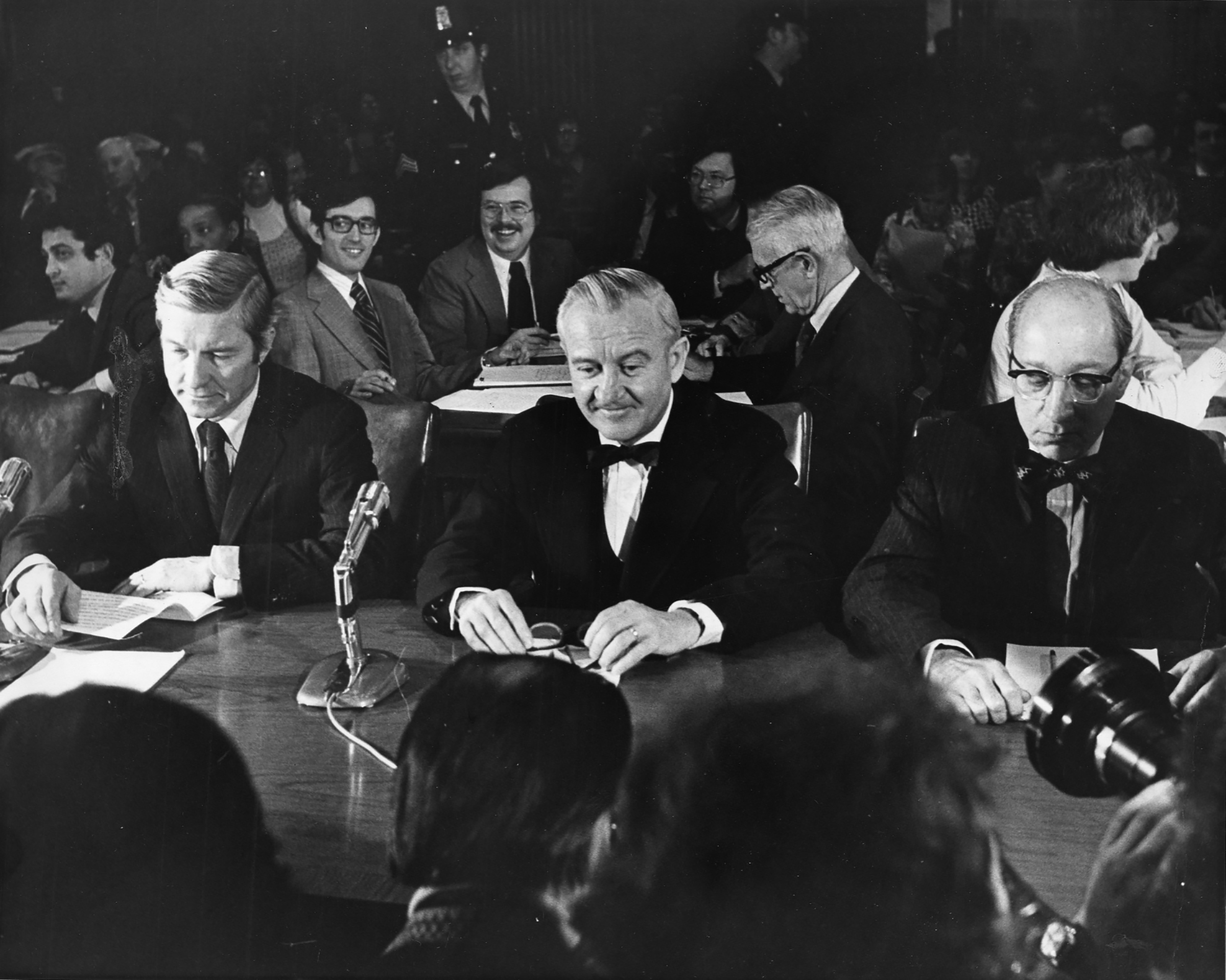 Supreme Court nominee John Paul Stevens is flanked by Sen. Charles Percy, left, and Attorney General Edward Levi at a confirmation hearing before the Senate Judiciary Committee in Washington, D.C., on Dec. 8, 1975.