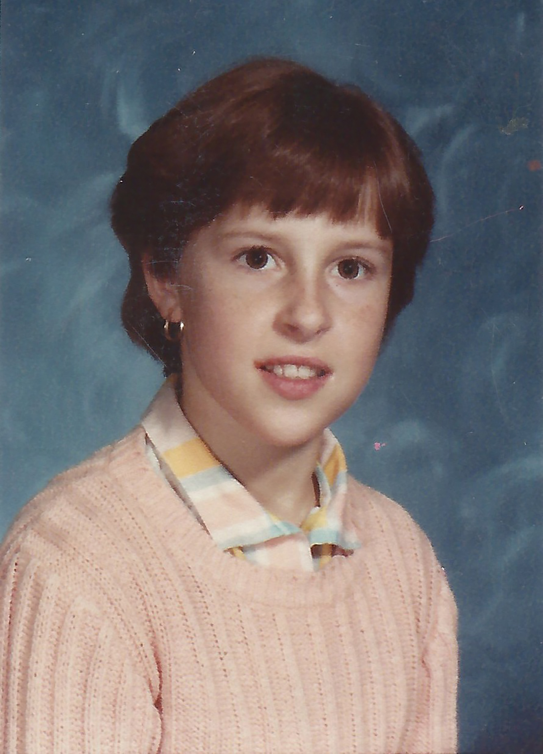 Teristi’s school portrait circa 1984, the year she started at Great Lakes Gymnastics.