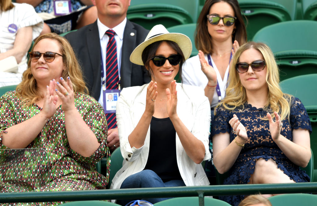 Meghan, Duchess of Sussex (C) attends day 4 of the Wimbledon Tennis Championships at the All England Lawn Tennis and Croquet Club on July 04, 2019 in London, England. (Karwai Tang—Getty Images)