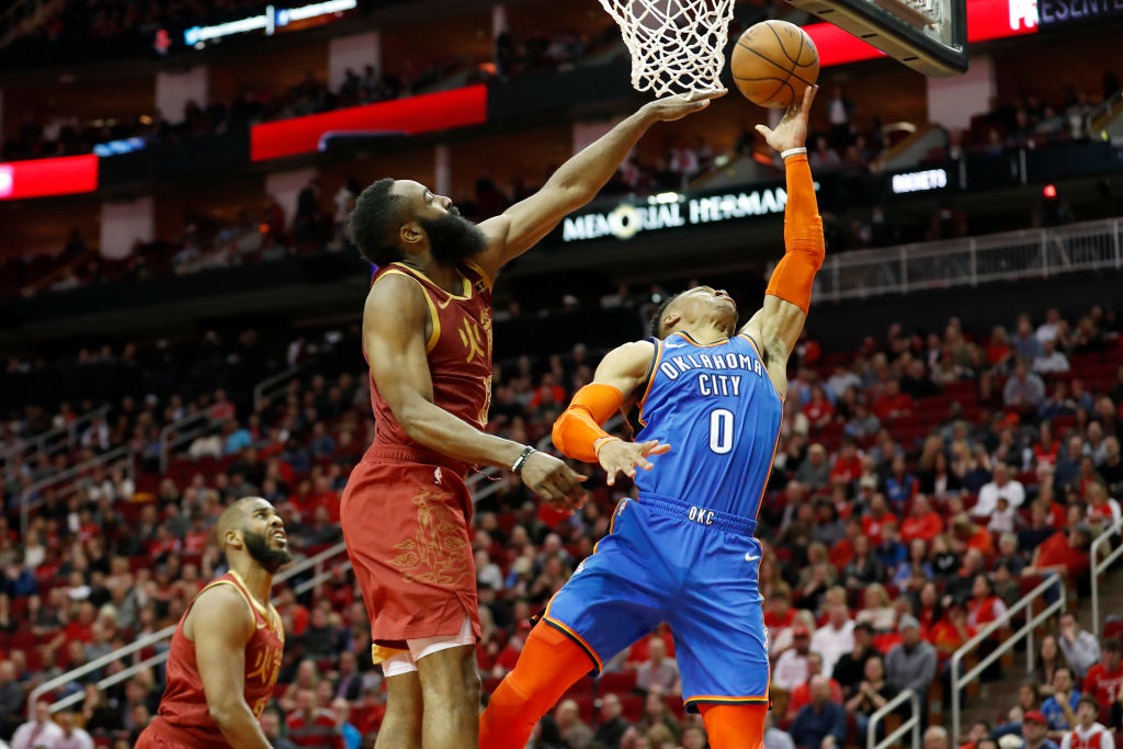 Russell Westbrook of the Oklahoma City Thunder goes up for a shot defended by James Harden  of the Houston Rockets in Houston, TX on Feb. 9, 2019. (Tim Warner&mdash;Getty Images)