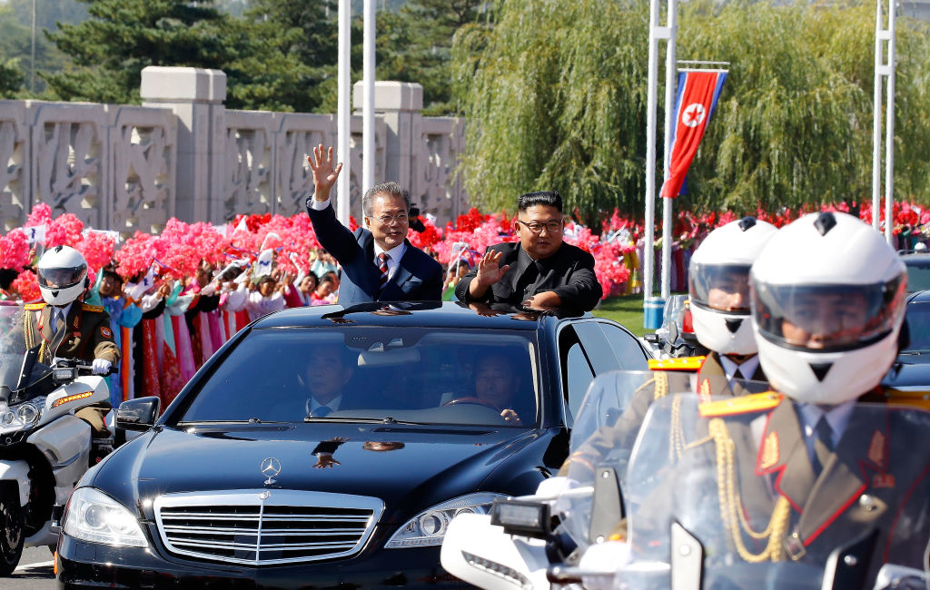 South Korean President Moon Jae-in (and North Korean leader Kim Jong-un ride in a Mercedes in Pyongyang, North Korea on Sept. 18, 2018. (Pyeongyang Press Corps/Getty Images)