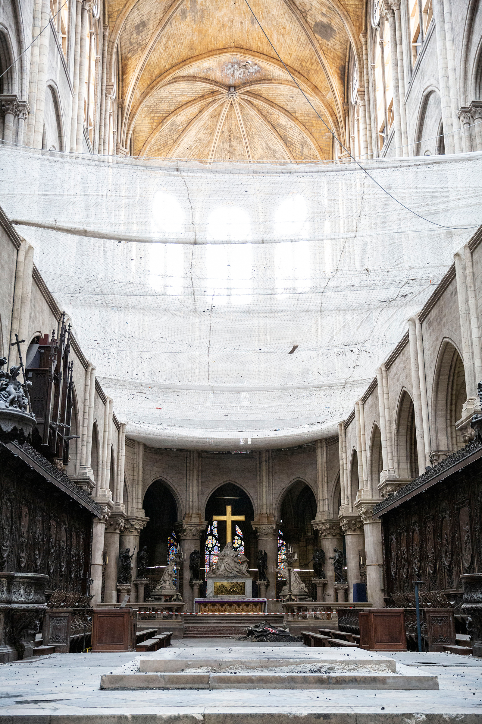 Netting installed to catch falling debris inside Notre Dame on July 11. (Patrick Zachmann—Magnum Photos for TIME)