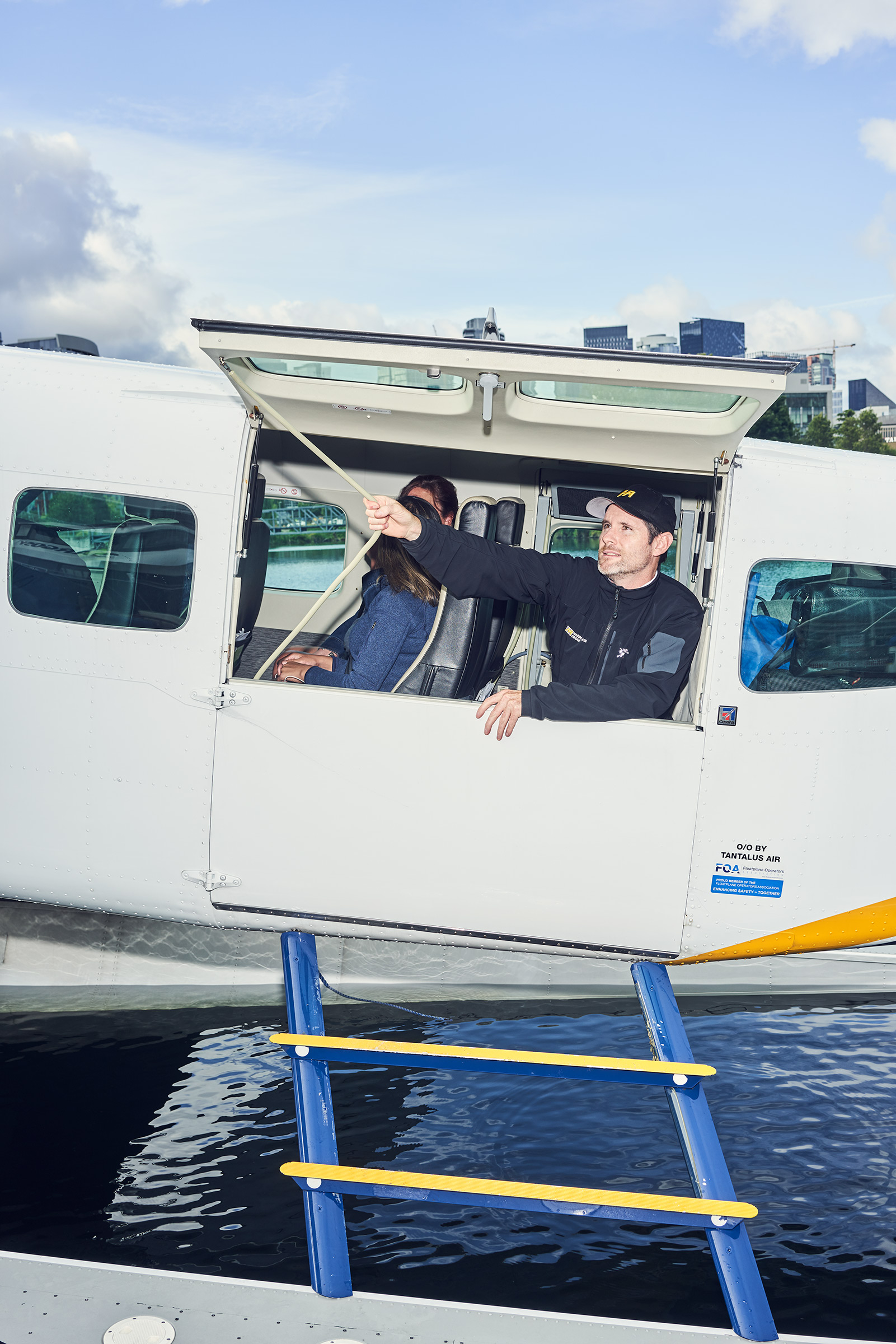 A Harbour Air crew member prepares for take-off on a seaplane flying from Seattle to Vancouver on July 11. When the Vancouver-Seattle route launched last year, tech companies bought tickets in bulk so their employees could go back and forth between Canada and the United States easily.