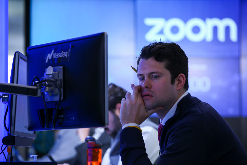 A trader work after the Nasdaq opening bell ceremony on April 18, 2019 in New York City. The video-conferencing software company Zoom announced its IPO priced at $36 per share, at an estimated value of $9.2 billion. (Kena Betancur&mdash;Getty Images)