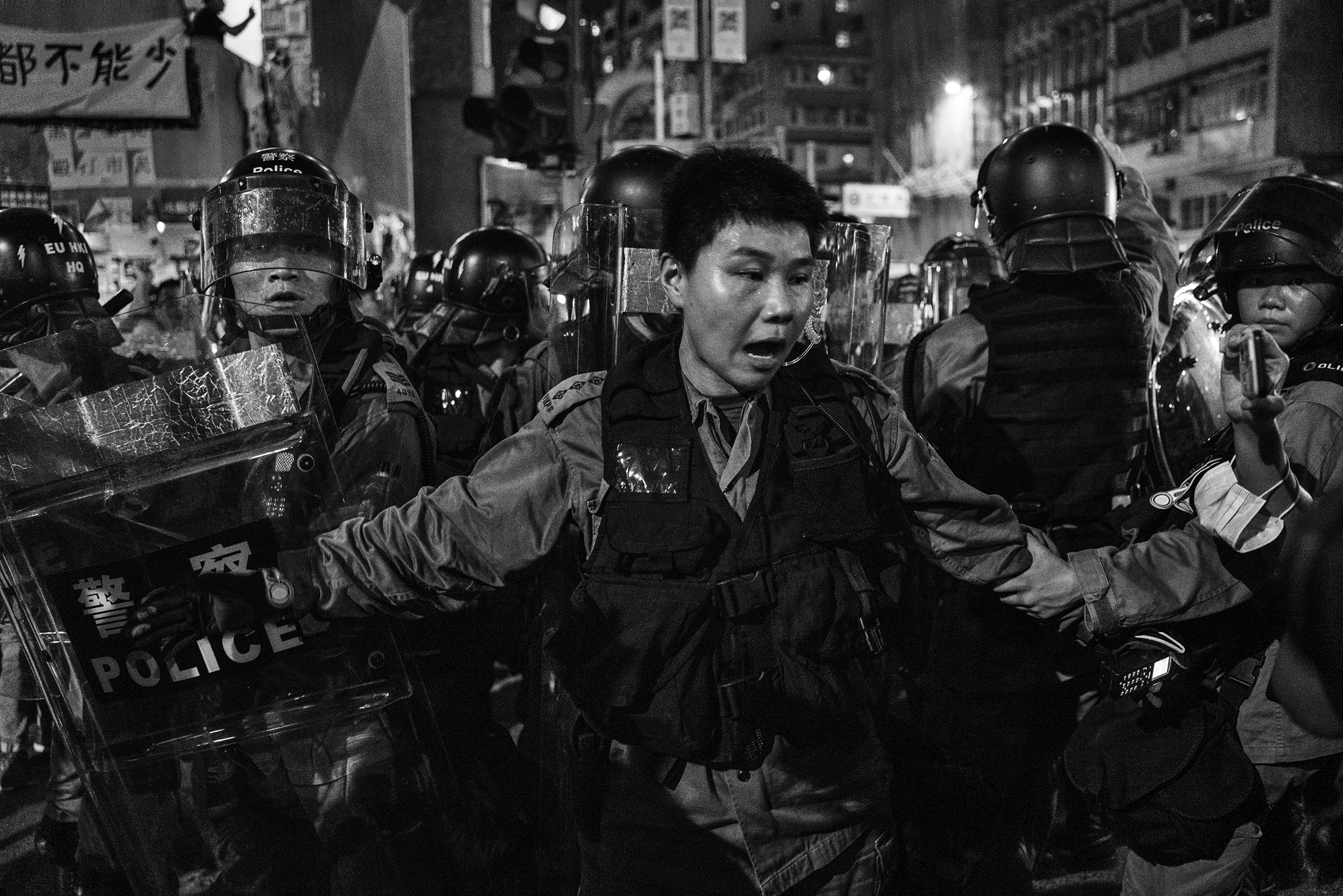 Police and local residents clash in the Sai Wan Ho area of Hong Kong on Aug. 12. (Adam Ferguson for TIME)