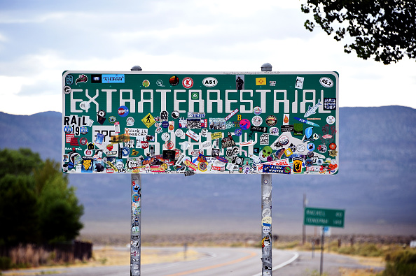 RACHEL, NEVADA - JULY 22:  An Extraterrestrial Highway sign covered with stickers is seen along state route 375 on July 22, 2019 near Rachel, Nevada. State officials drew inspiration from the alien legends at the nearby top-secret military installation known as Area 51 and dubbed the 98 mile route from U.S. highway 93 to U.S. highway 6, the Extraterrestrial Highway in February 1996. A Facebook event entitled, "Storm Area 51, They Can't Stop All of Us," which the author stated was meant as a joke, calls for people to storm the highly classified U.S. Air Force facility near Rachel on September 20, 2019, to address a conspiracy theory that the U.S. government is conducting tests with space aliens.  (Photo by David Becker/Getty Images)