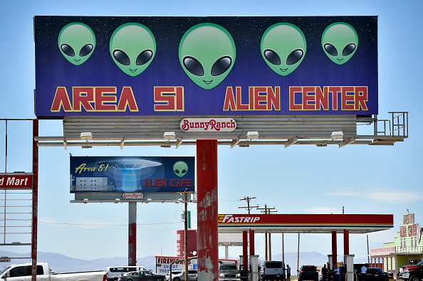 A billboard advertising a convenience store named Area 51 Alien Center is seen along U.S. highway 95 in Amargosa Valley, Nevada on July 21, 2019.