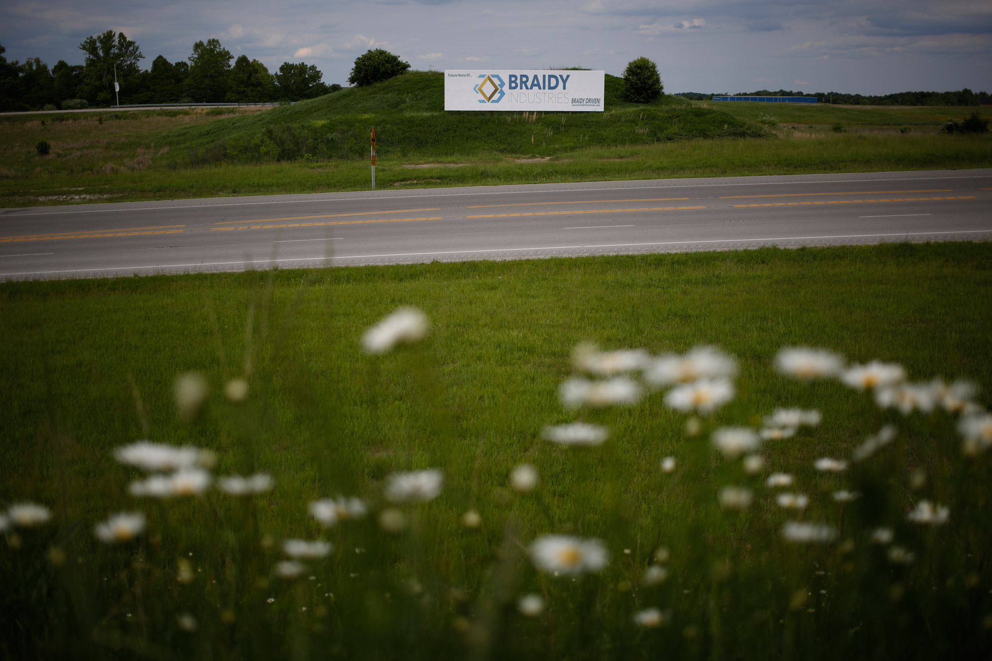 A Braidy sign looms over the future location of the company’s aluminum mill in northeastern Kentucky (Luke Sharrett for TIME)