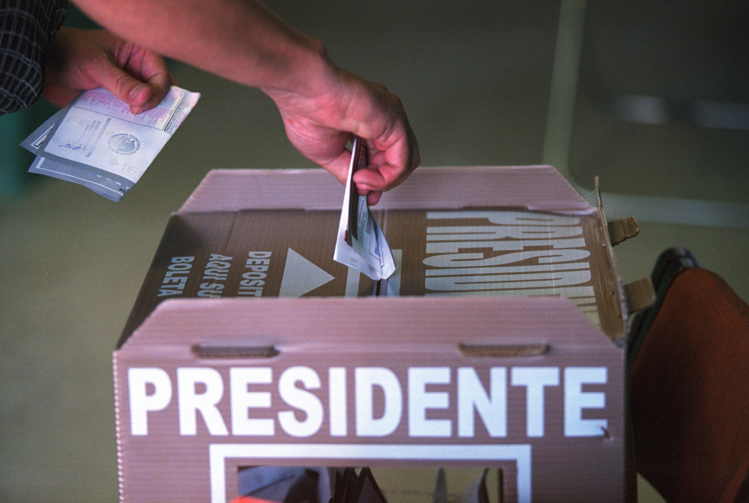A citizen casts his vote in the Mexican presidential election July 2, 2000, in Ciudad Juarez, Mexico. (Joe Raedle—Getty Images)
