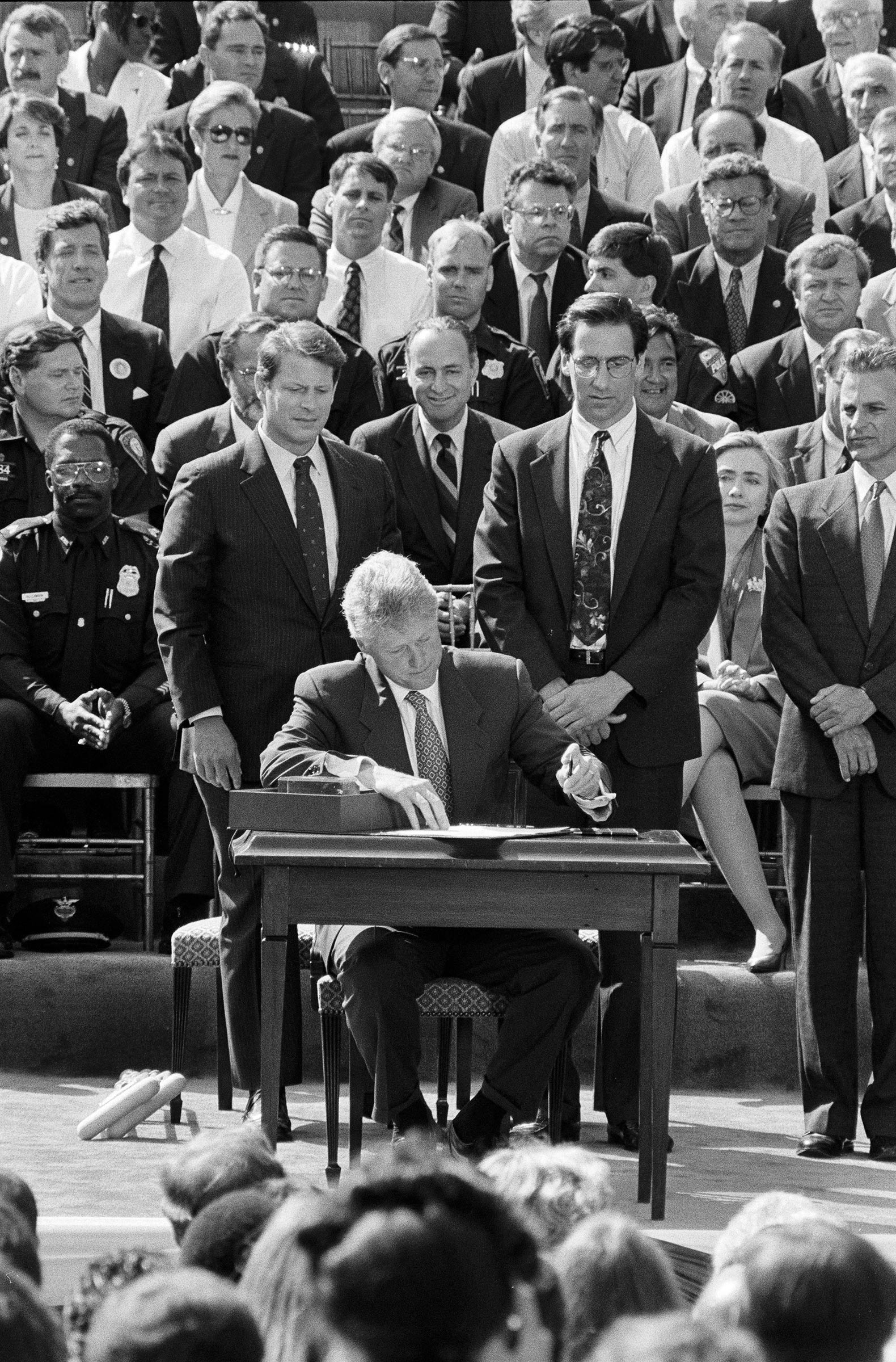 President Clinton signs the Violent Crime Control and Law Enforcement Act at the White House on Sept. 13, 1994. (Stephen Crowley—The New York Times/Redux)