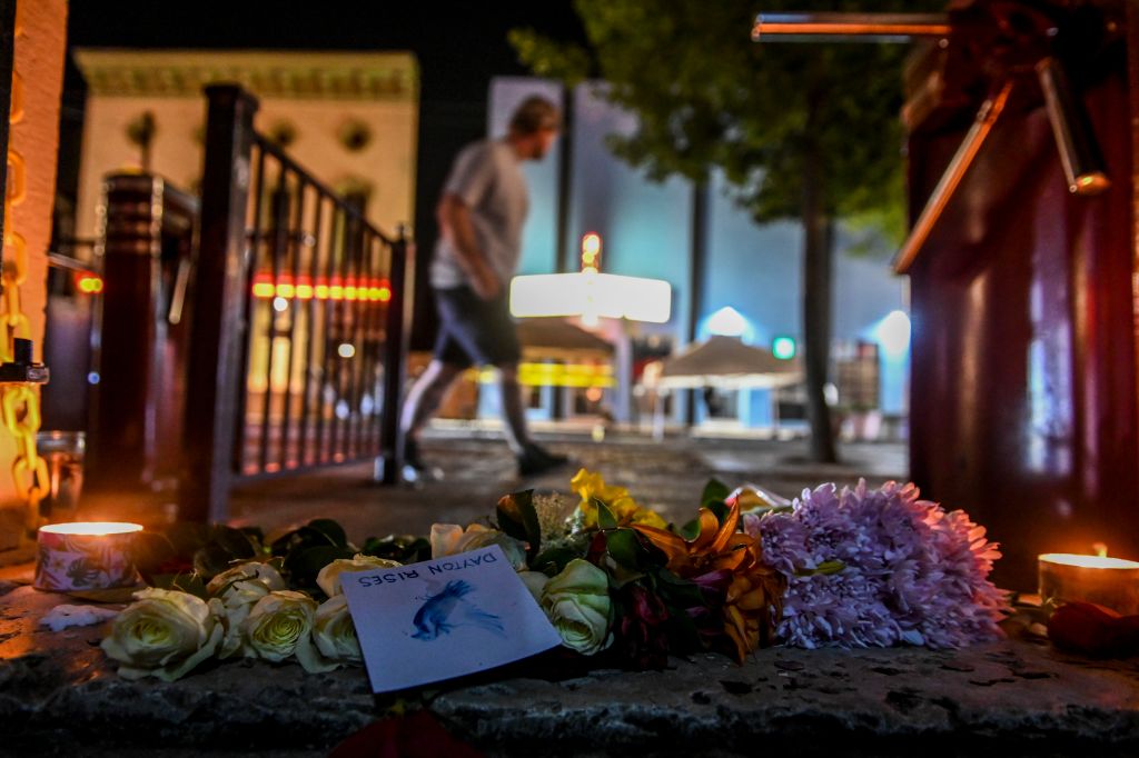 Flowers and candles mark the scene of the August mass shooting in Dayton, Ohio. (The Washington Post—The Washington Post/Getty Images)