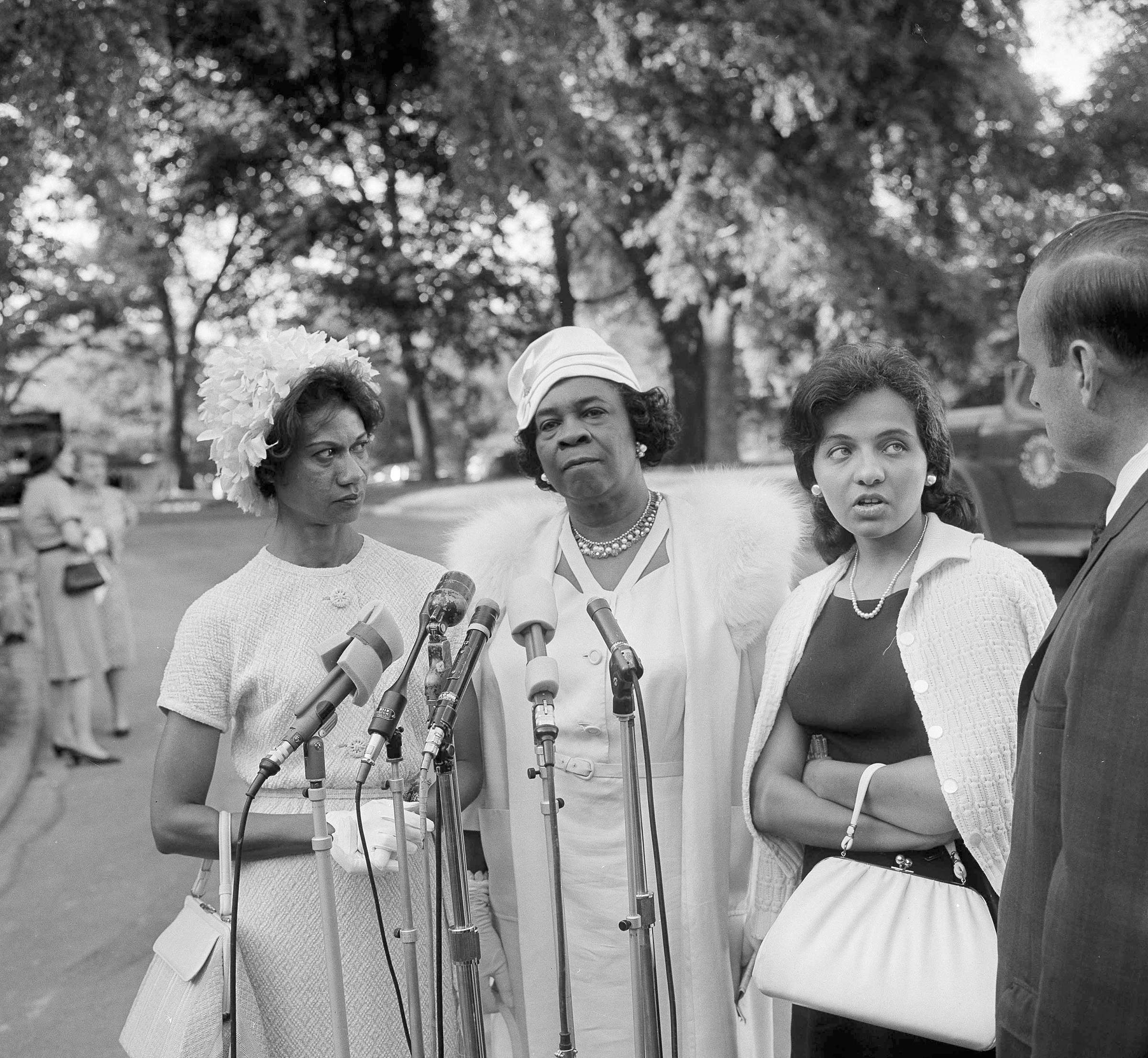 Gloria Richardson, left, a leader in the Cambridge, Md., integrationist's movement, Dr. Rosa L. Gragg of the National Association of Colored Woman's Clubs and Mrs. Diane Nash Bevel, right, representing the Southern Christian Leadership Committee, are interviewed as they leave the White House in Washington, D.C., July 9, 1963. (Henry Burroughs—AP)