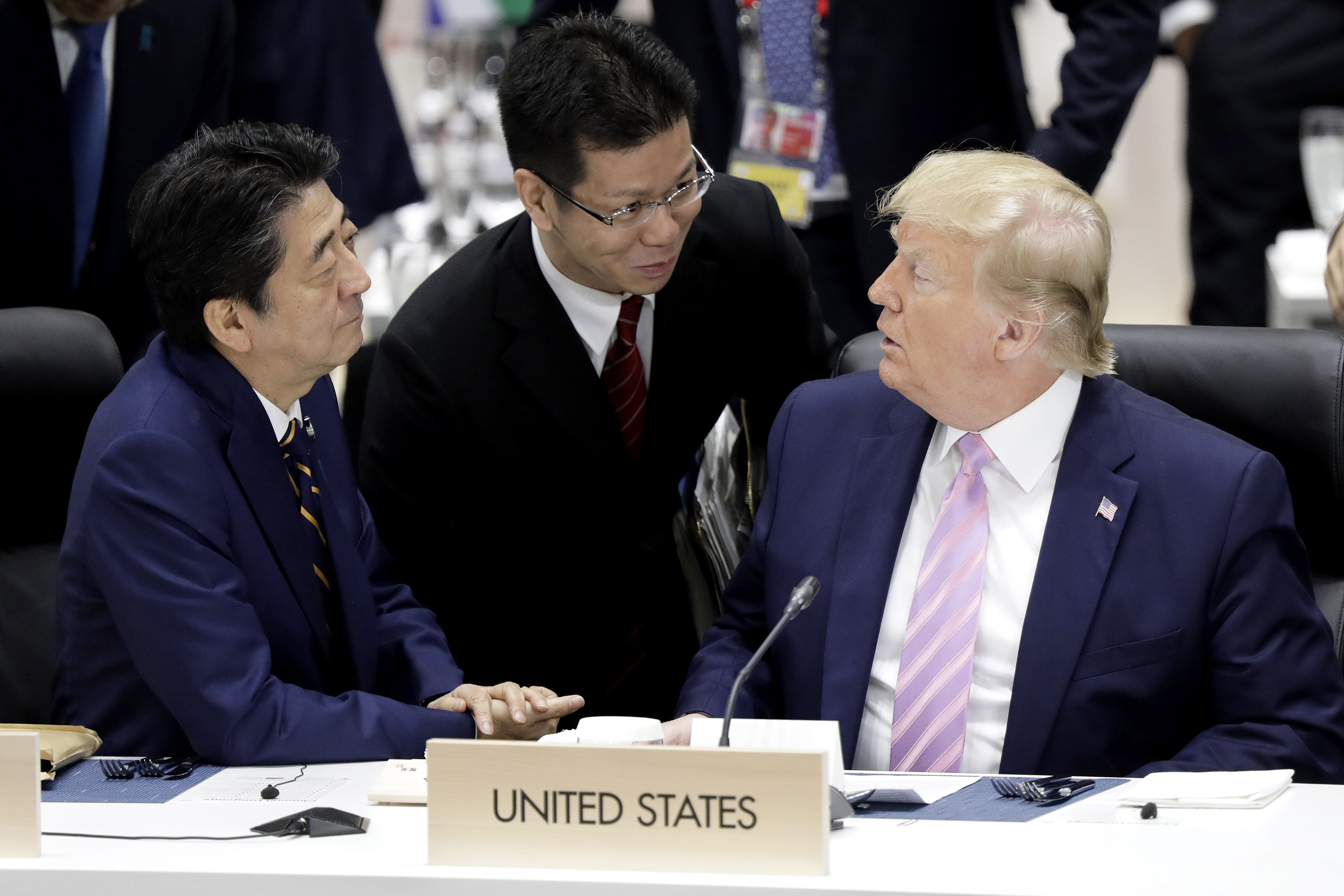 President Donald Trump is waging both a trade war and an emergency currency war. It will be hard for him to win both. He has complained that the value of the Euro and the Yen are too high compared to the dollar. He is seen at the G20 Summit in June 2019 with Japanese Prime Minister Shinzo Abe (left). (Kiyoshi Ota - Pool/Getty Images)