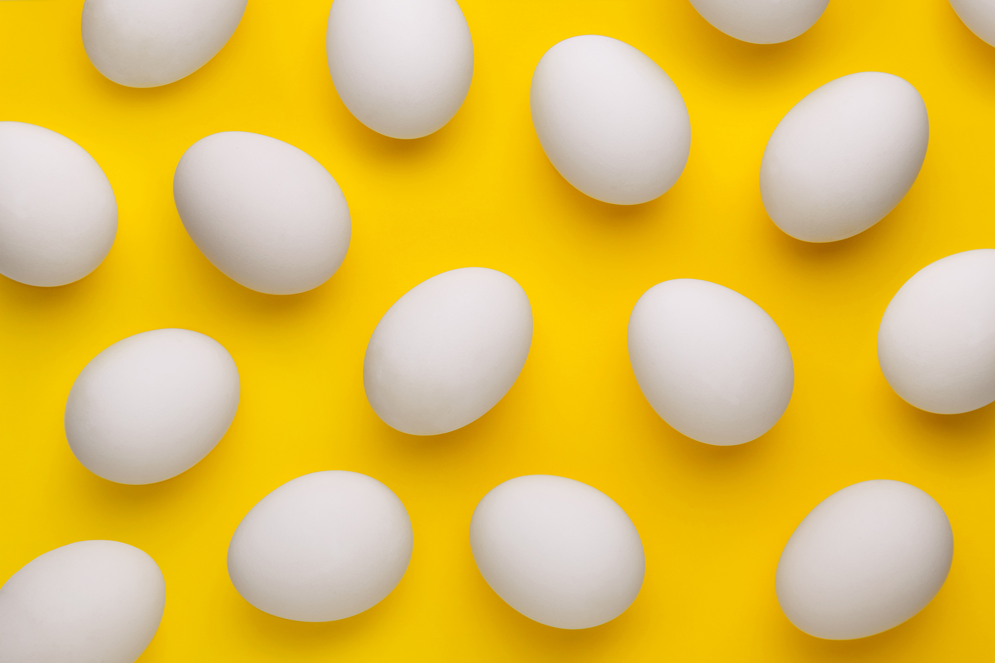 Full Frame Shot Of Eggs On Yellow Background