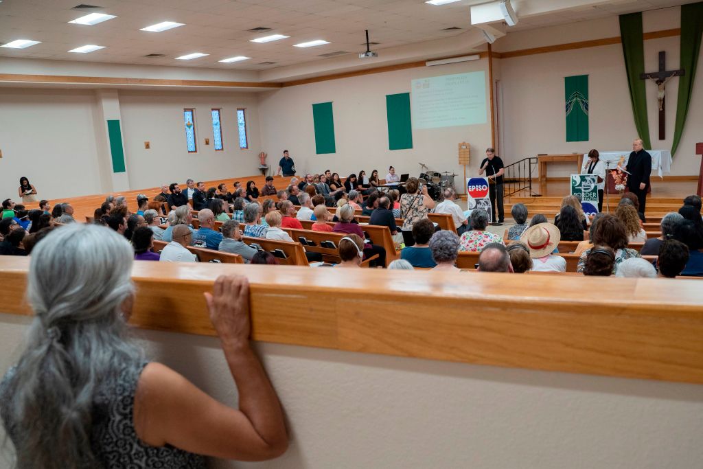 Attendees are pictured during the El Paso Interreligious Sponsoring Organization's assembly at St. Paul the Apostle Catholic Church to help the community discuss their feelings in the wake of the mass shooting in El Paso, Texas on August 8, 2019. (PAUL RATJE—AFP/Getty Images)